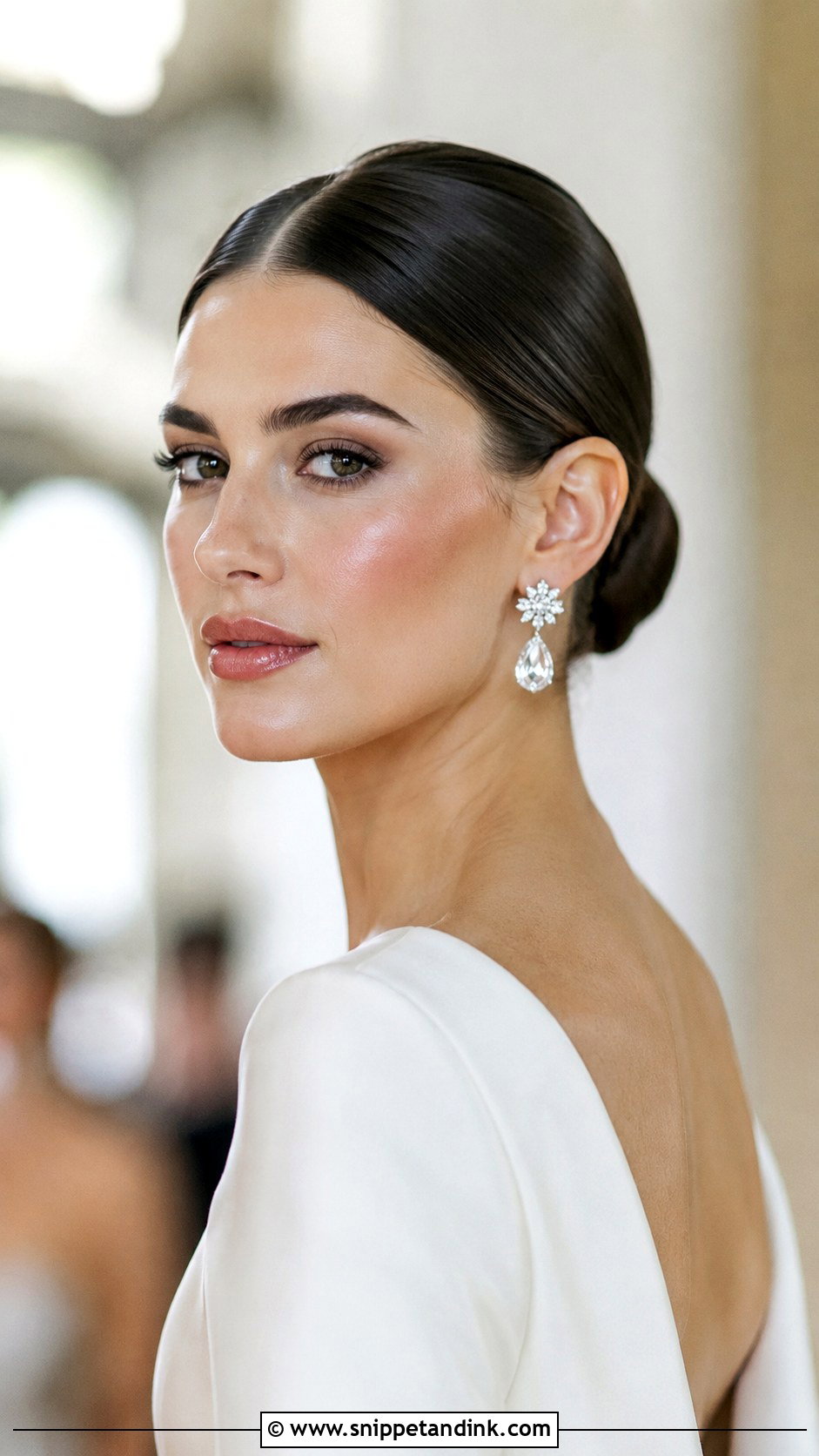 Sleek Middle Part Bun - Snippet and Ink - 20 Winter Wedding Hair Ideas