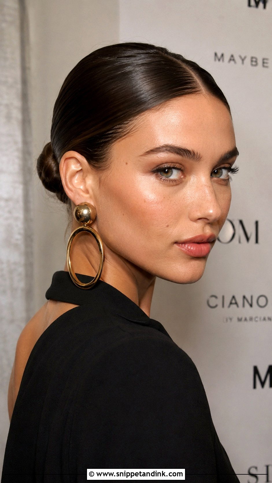 Sleek Middle Part Bun - Snippet and Ink - 25 Easy Wedding Guest Hair Ideas