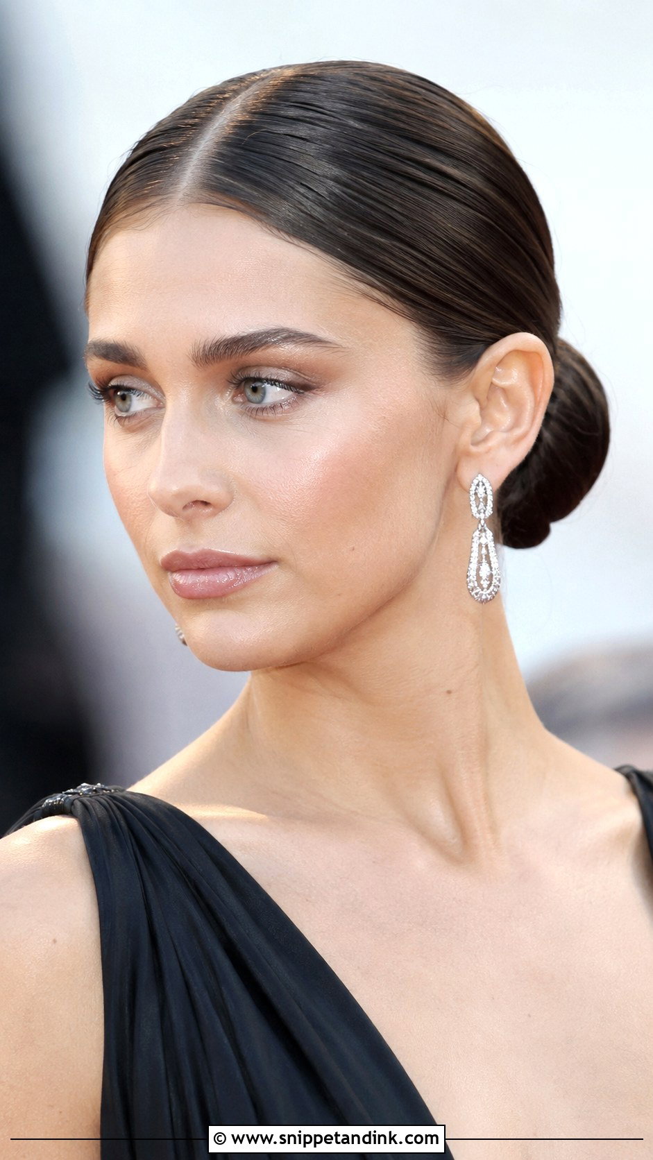 Sleek Middle Part Bun for Wedding - Snippet and Ink - 25 Hairstyles for Wedding Function