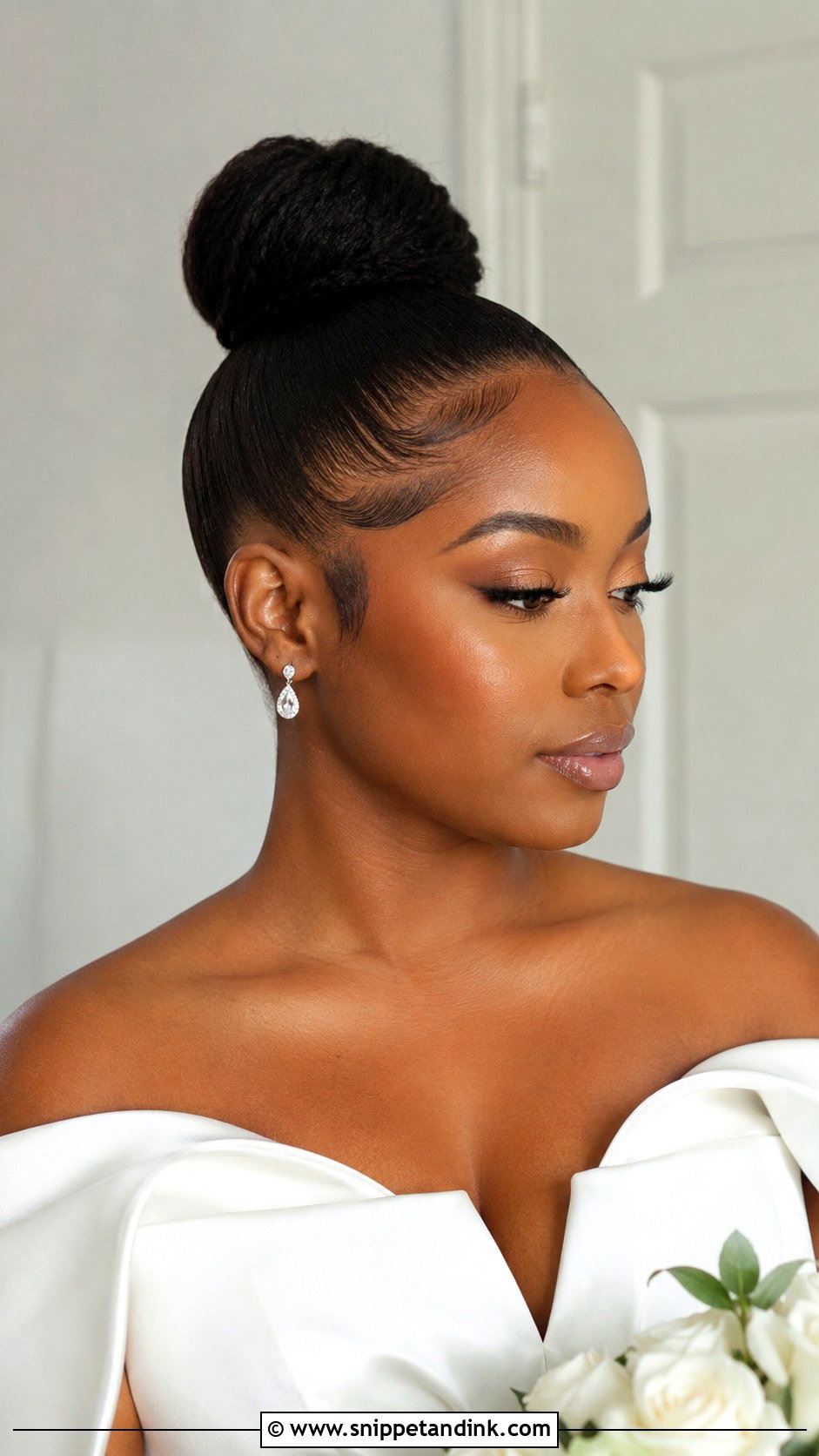 Sleek Natural Bun With Edges - Snippet and Ink - 25 Afro Wedding Hairstyles
