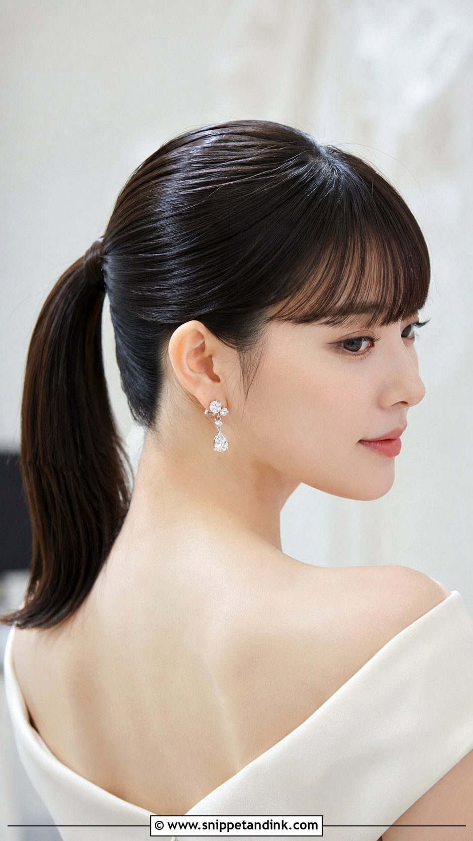Sleek Ponytail With Bangs - Snippet and Ink - 15 Wedding Hairstyles for Bangs