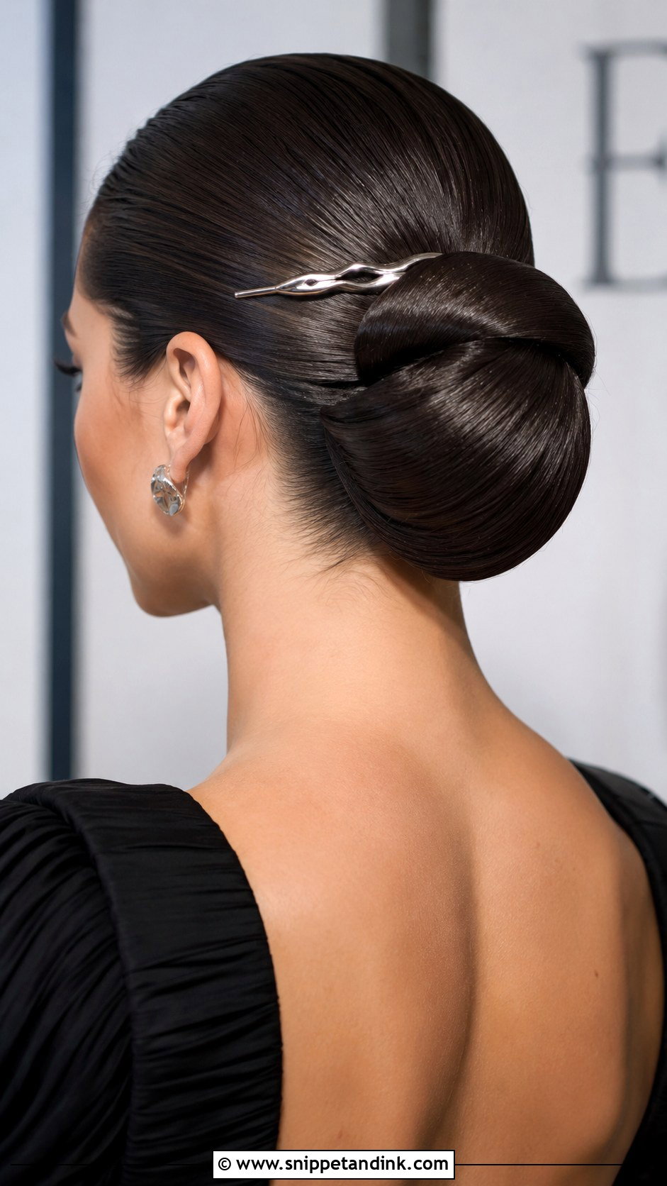 Sleek Sculpted Chignon - Snippet and Ink - 20 Elegant Wedding Hair Updo Ideas