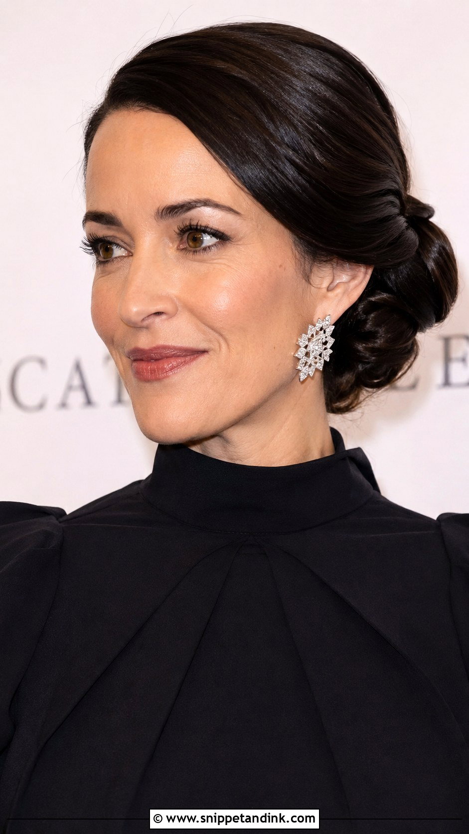 Sleek Side Twisted Updo - Snippet and Ink - 25 Side Updo Wedding Hair Ideas