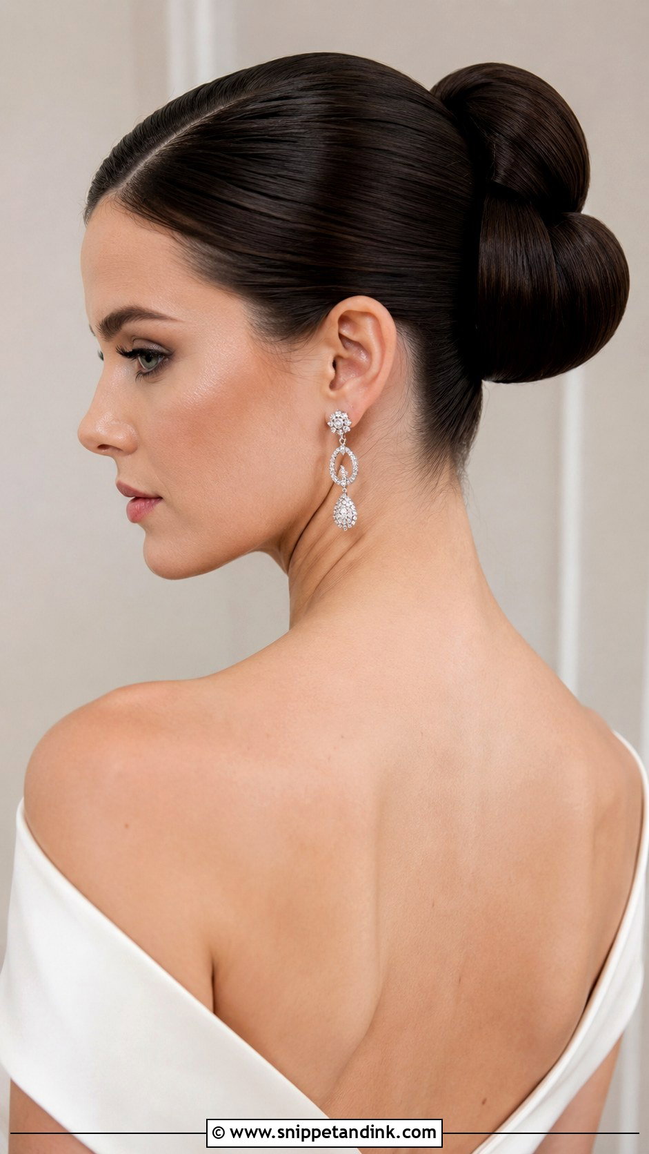Sleek Structured Bun for Modern Brides - Snippet and Ink - 25 Hair Up Dos for Weddings