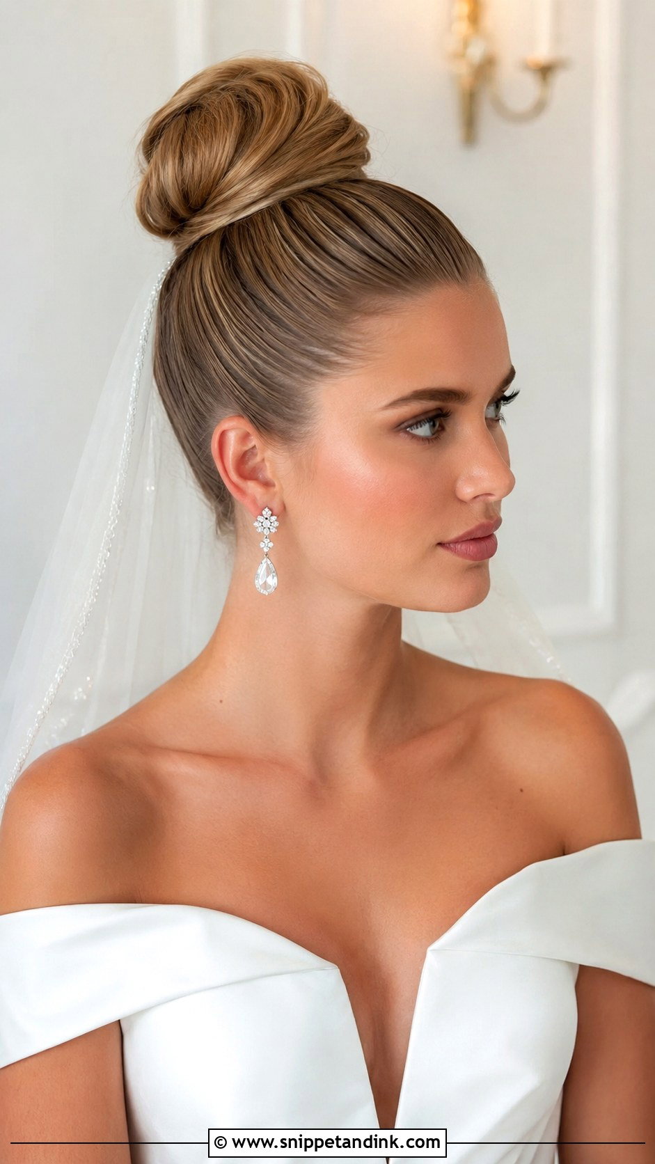 Sleek Top Knot - Snippet and Ink - 25 Wedding Hair Updo Front View Ideas