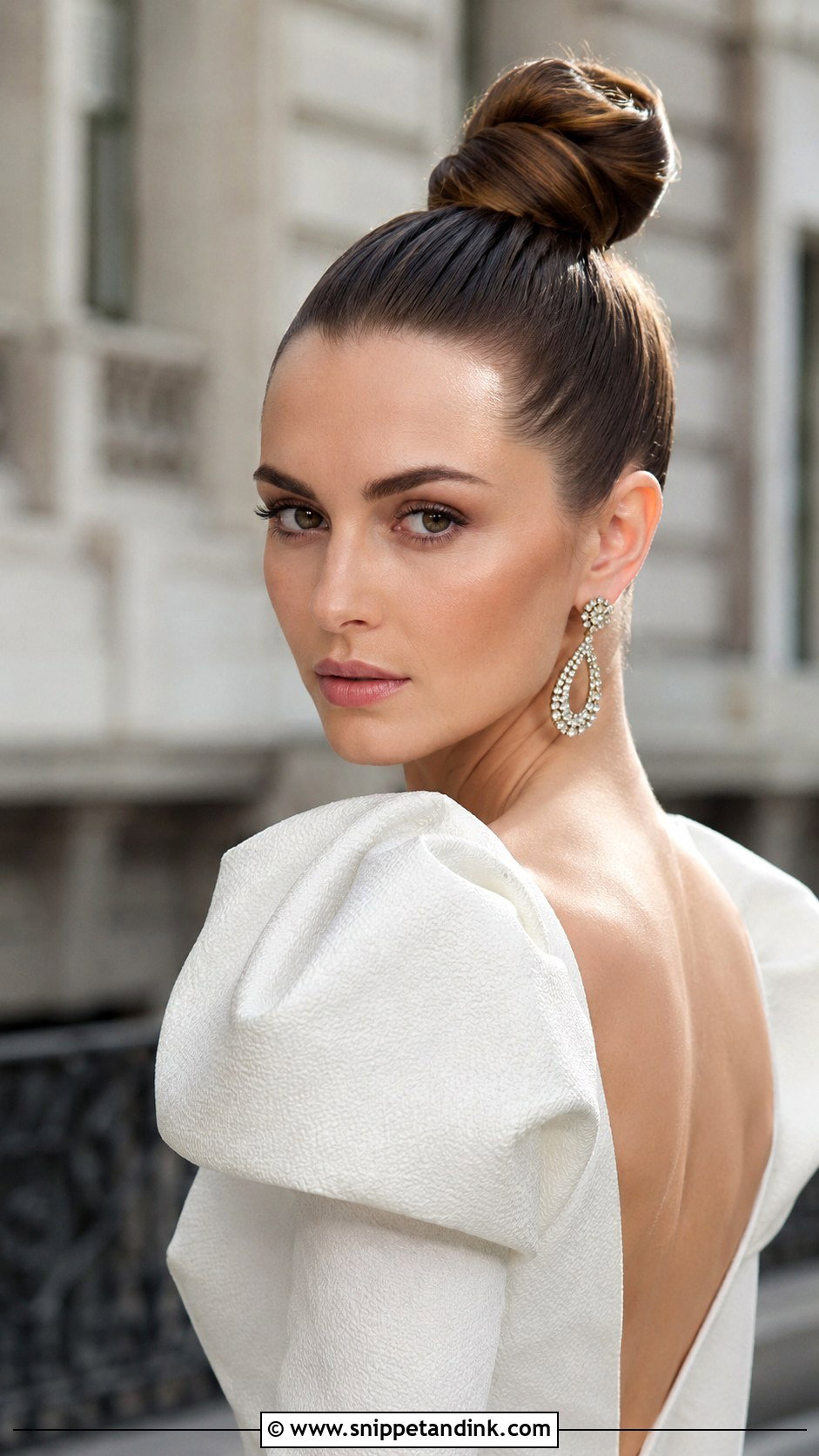 Sleek Top Knot Updo - Snippet and Ink - 25 Wedding Upstyles