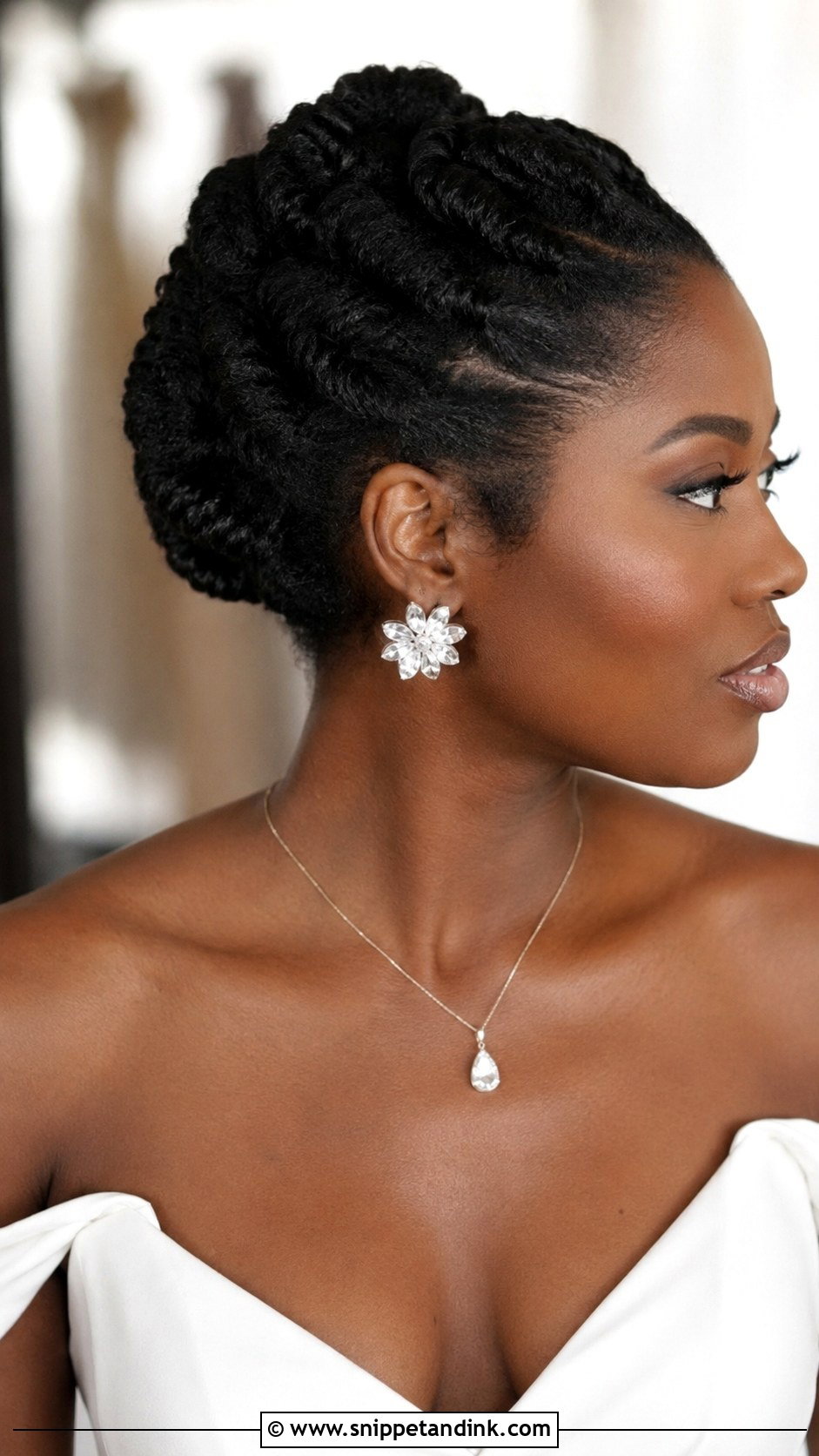 Sleek Twisted Updo - Snippet and Ink - 25 Natural Hair Updo Wedding Ideas