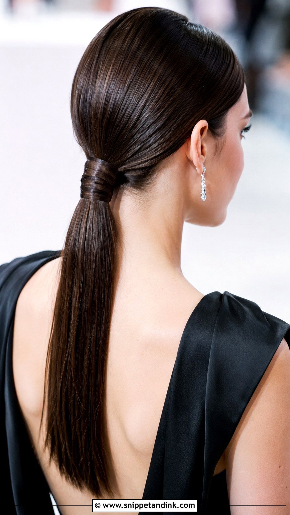 Sleek Wrapped Ponytail Updo - Snippet and Ink - 30 Wedding Guest Updo Ideas