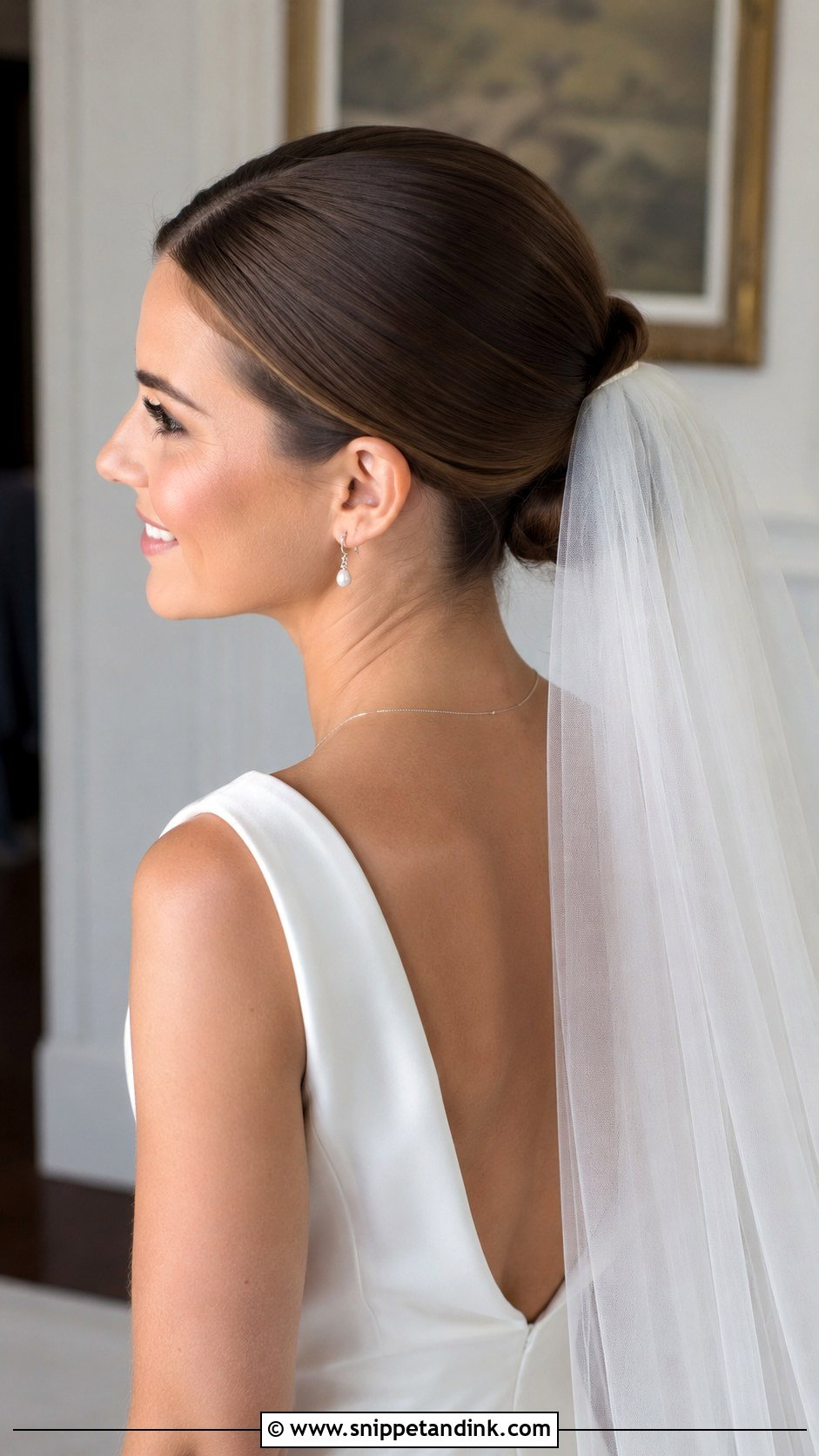 Slick Bun With Cathedral Veil Wedding Hairstyle - Snippet and Ink - 25 Slick Bun Wedding Hairstyles