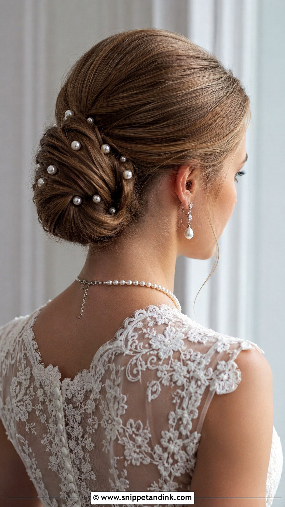 Slick Bun With Pearl Pins Wedding Hairstyle - Snippet and Ink - 25 Slick Bun Wedding Hairstyles