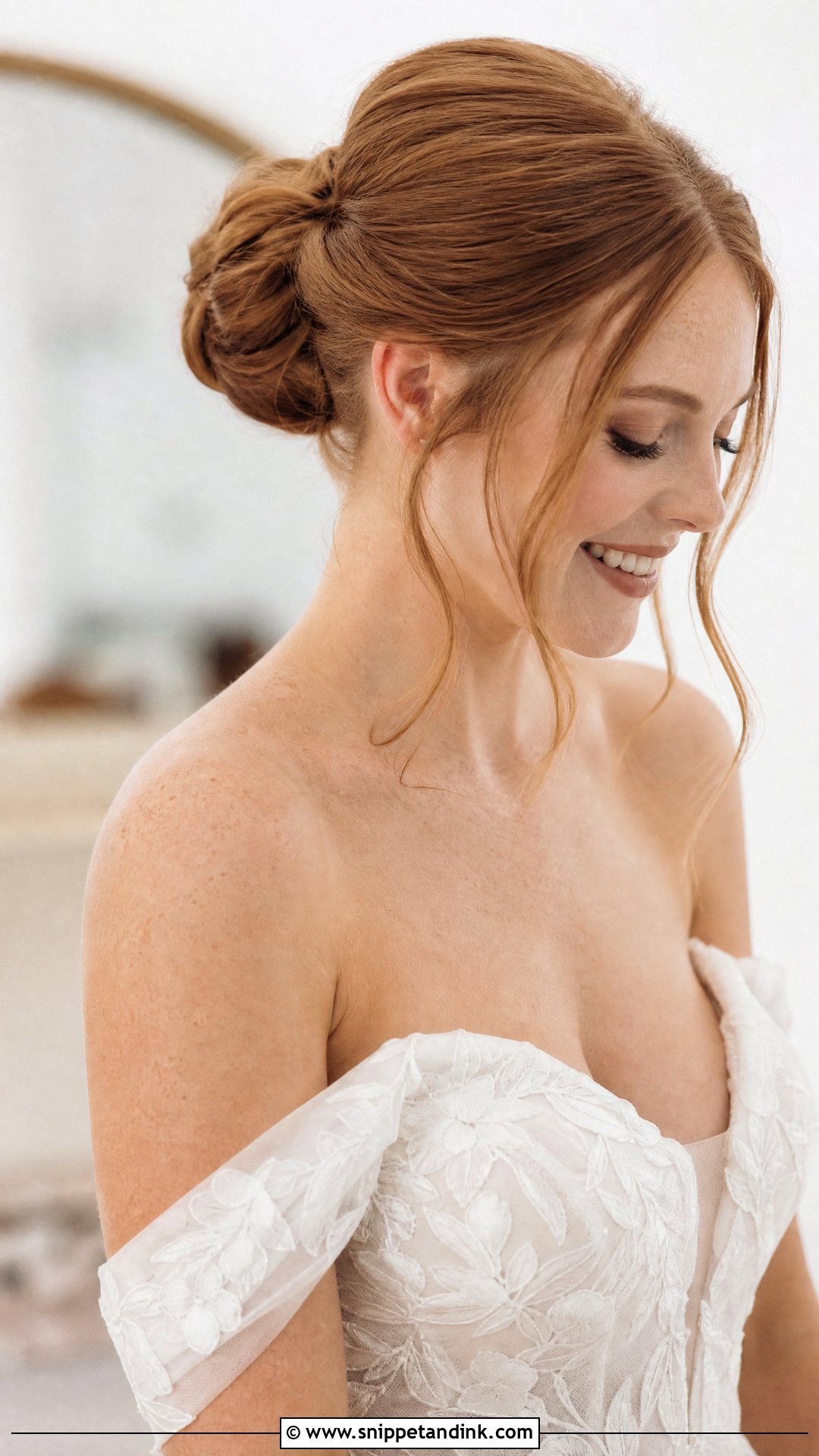 Slick Bun With Tendrils - Snippet and Ink - 20 Slick Bun Wedding Ideas