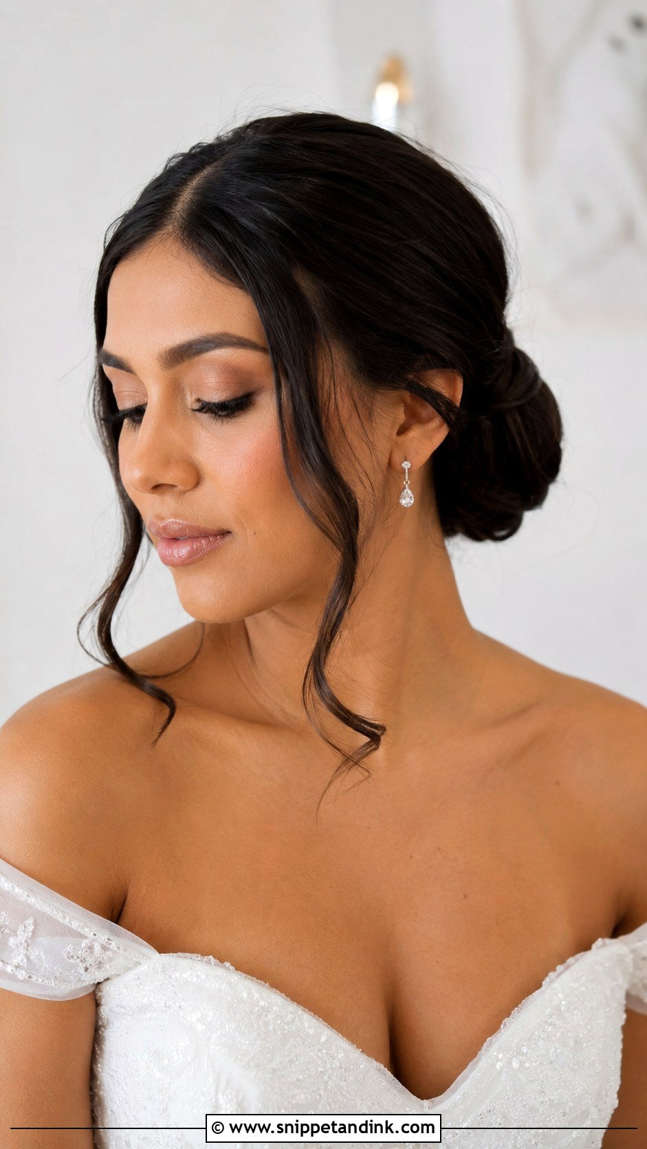 Slick Low Bun With Face Framing Pieces Wedding Hair - Snippet and Ink - 15 Slick Low Bun Wedding Hair Ideas