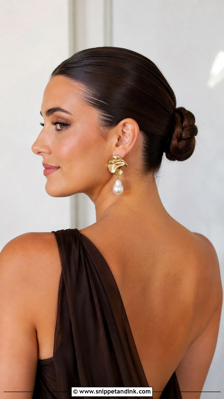Slicked Back Bun - Snippet and Ink - 25 Hairstyles for a Wedding Guest