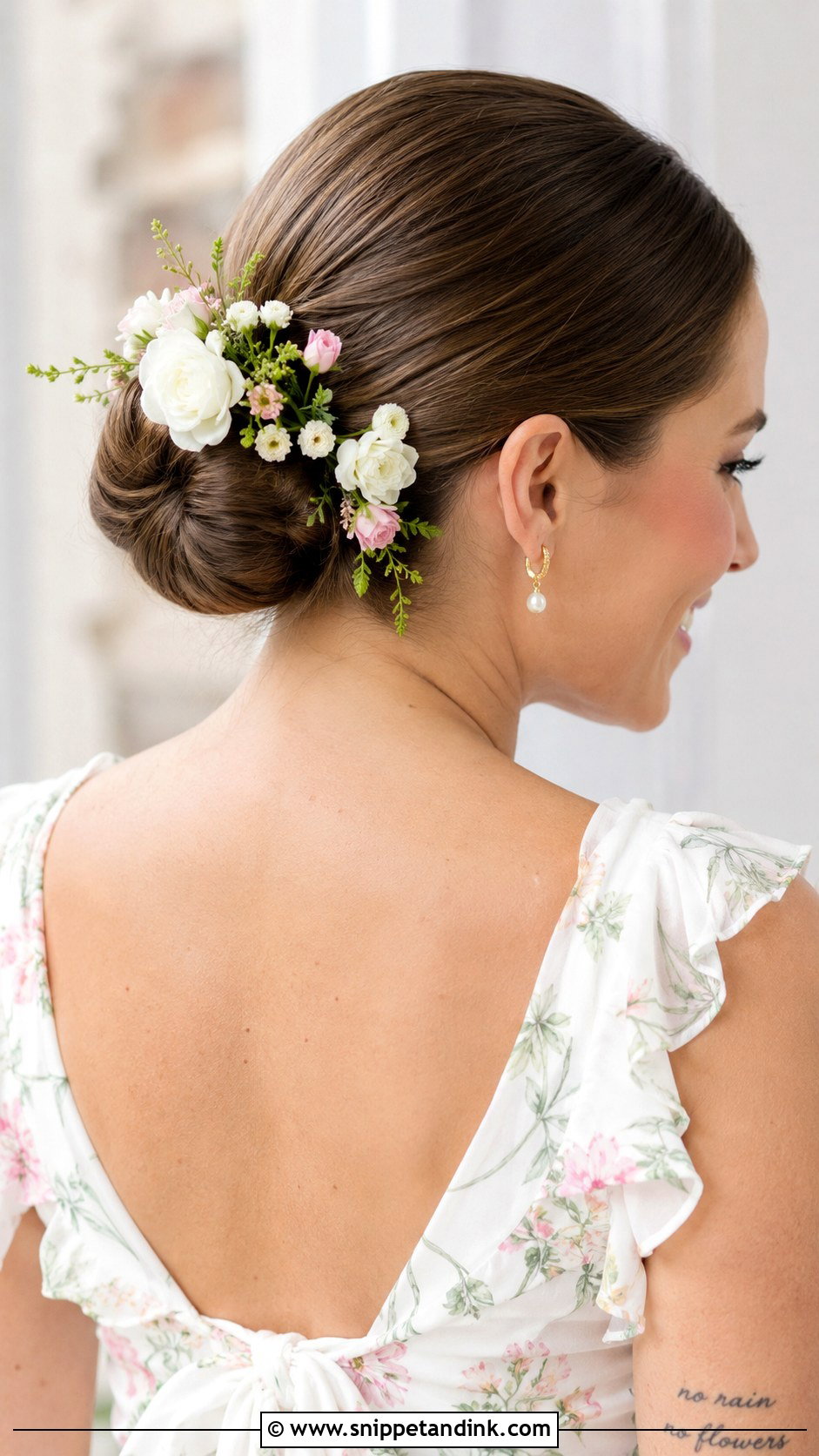 Slicked Back Bun With Flowers - Snippet and Ink - 20 Slicked Back Bun Wedding Hair Ideas