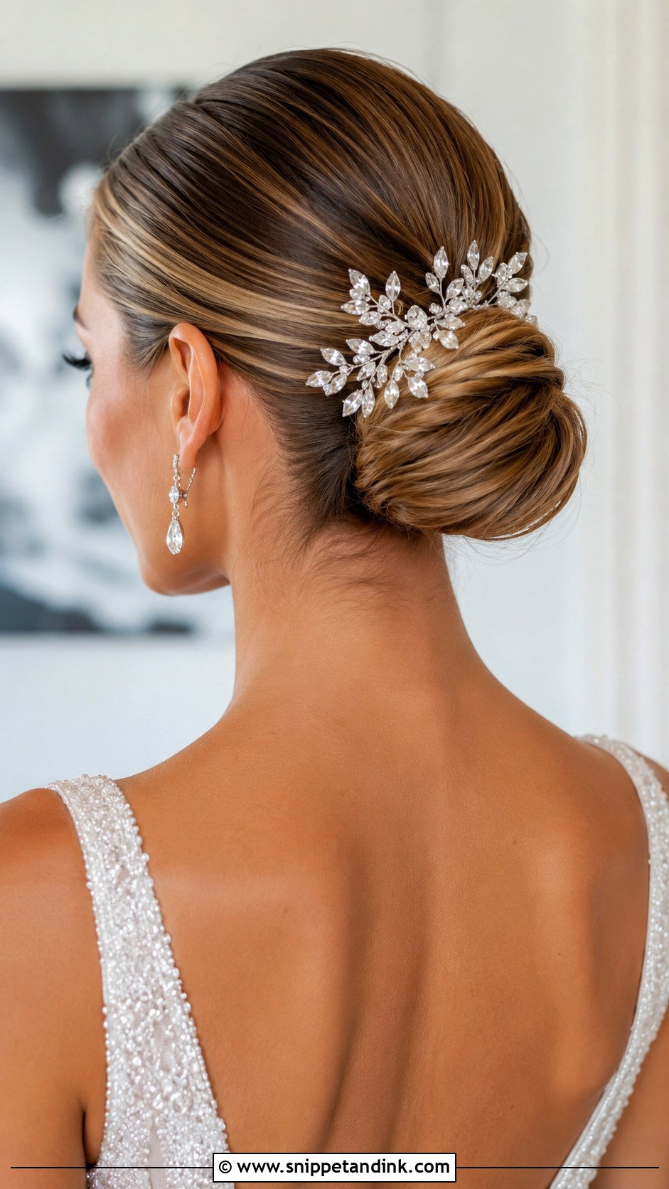 Slicked Back Bun With Statement Hair Comb - Snippet and Ink - 20 Slicked Back Bun Wedding Hair Ideas