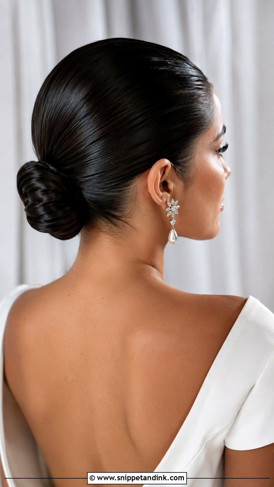 Slicked Back Low Bun - Snippet and Ink - 25 Hairstyles for Medium Length Hair for Wedding