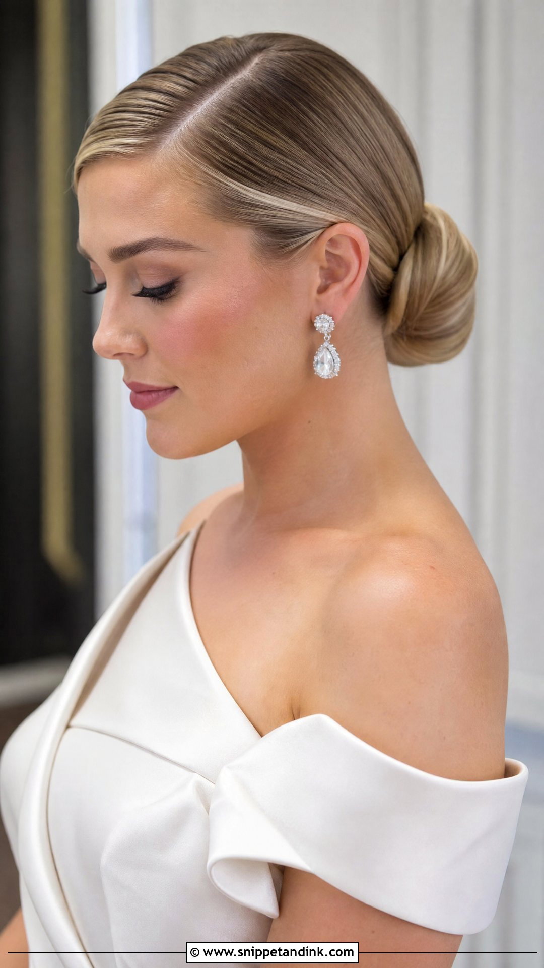 Slicked Back Side Part Bun - Snippet and Ink - 20 Slick Back Bridal Hair Ideas