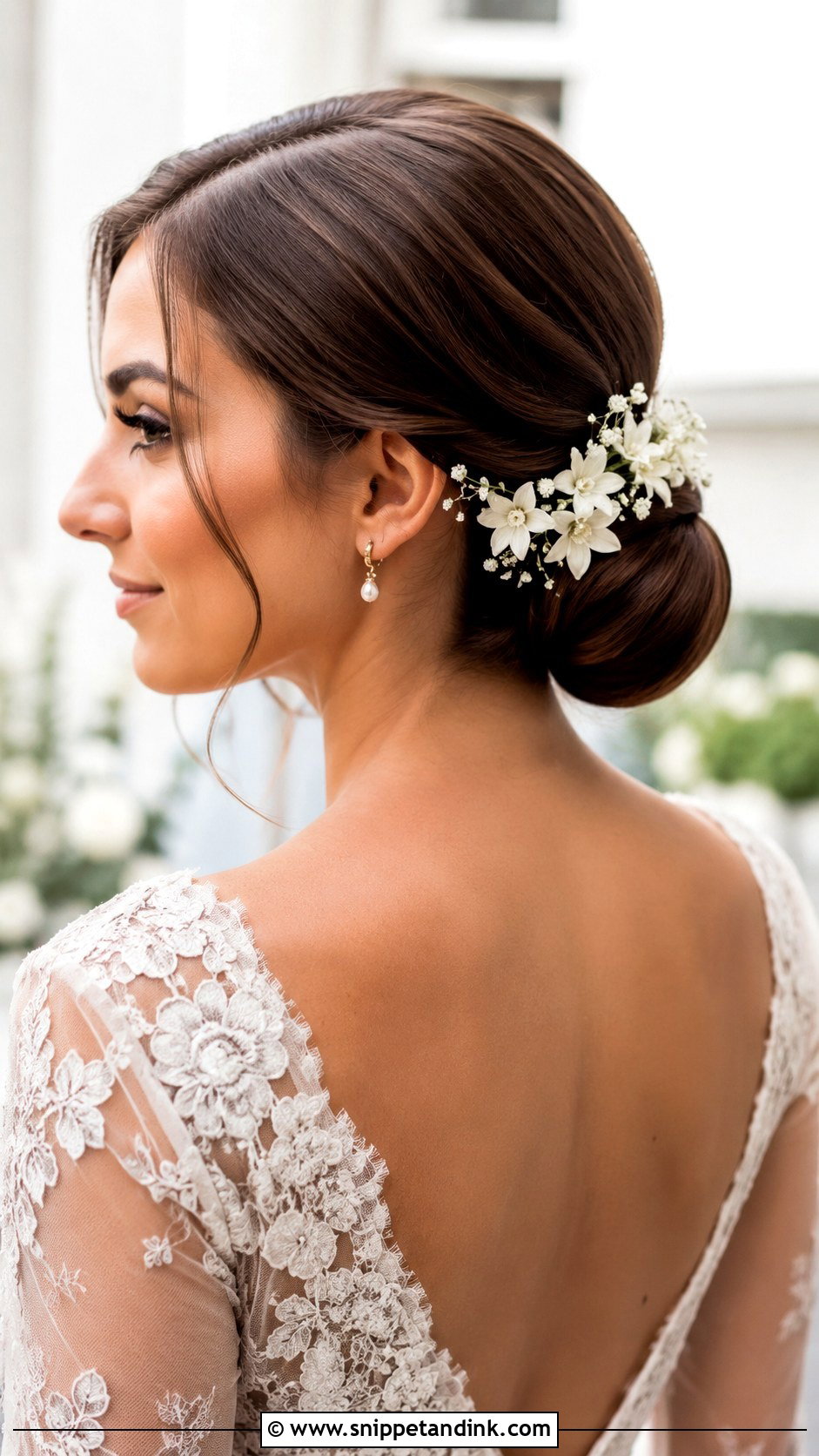 Slicked Bun With Floral Pins Wedding Hair - Snippet and Ink - 15 Slicked Bun Wedding Hair Ideas