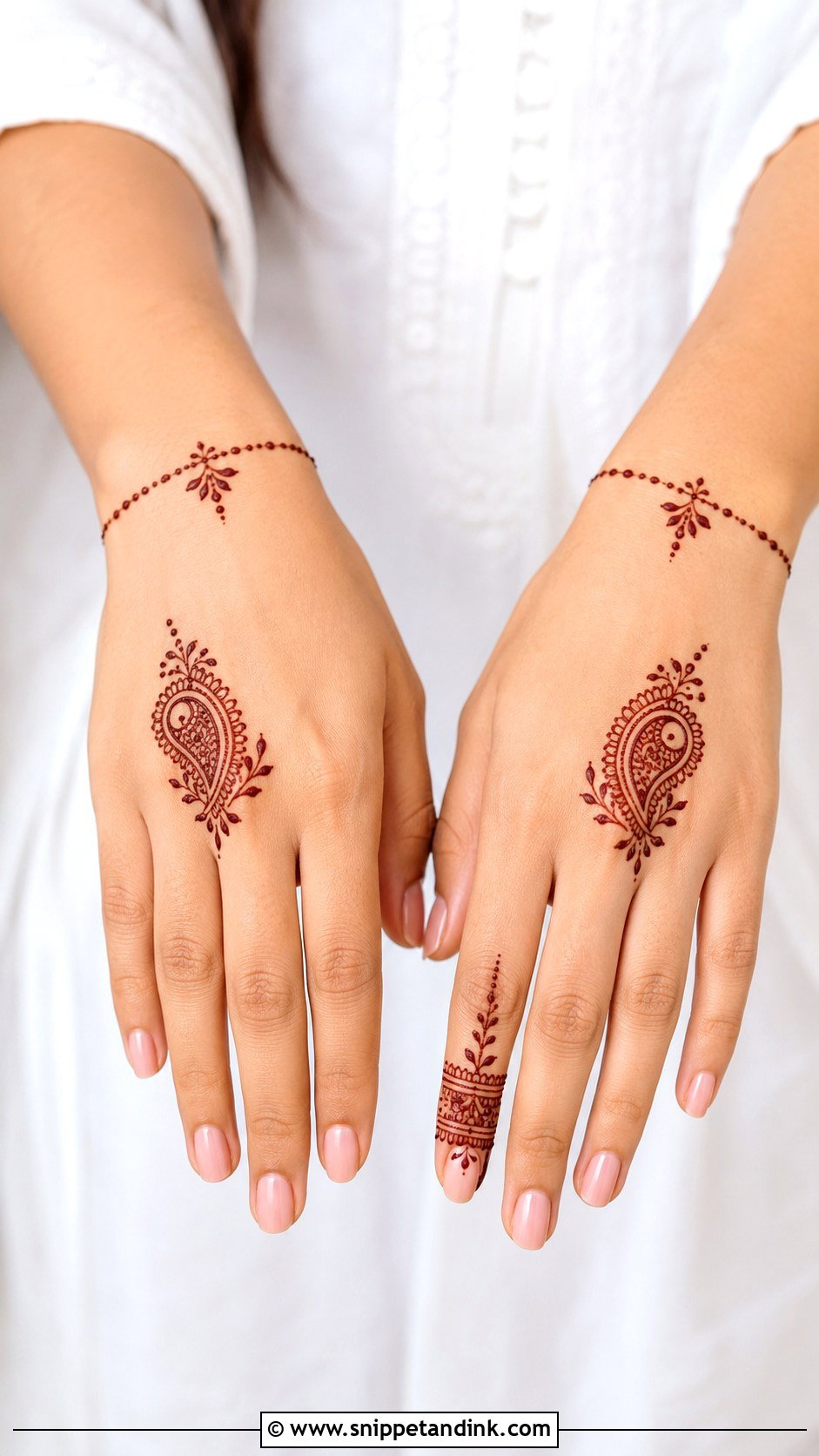 Small Paisley Back Hand Mehndi Design - Snippet and Ink - 30 Modern Minimal Back Hand Mehndi Designs