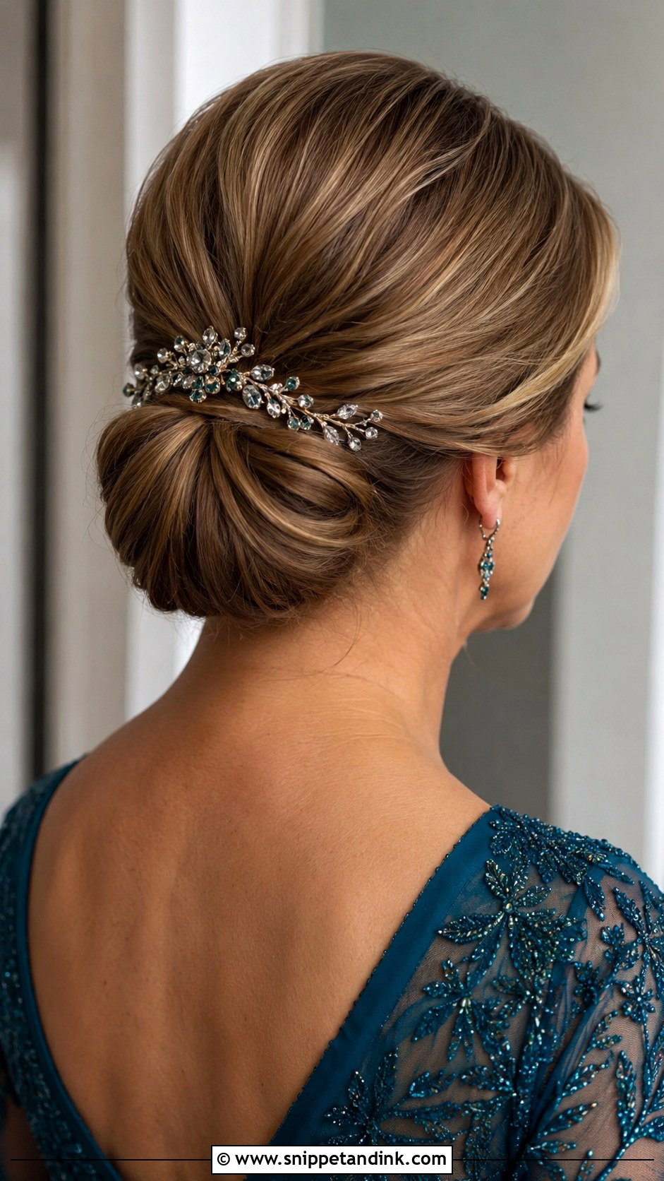 Smooth Bun with a Decorative Hair Accessory - Snippet and Ink - 20 Mother of Groom Hair Ideas