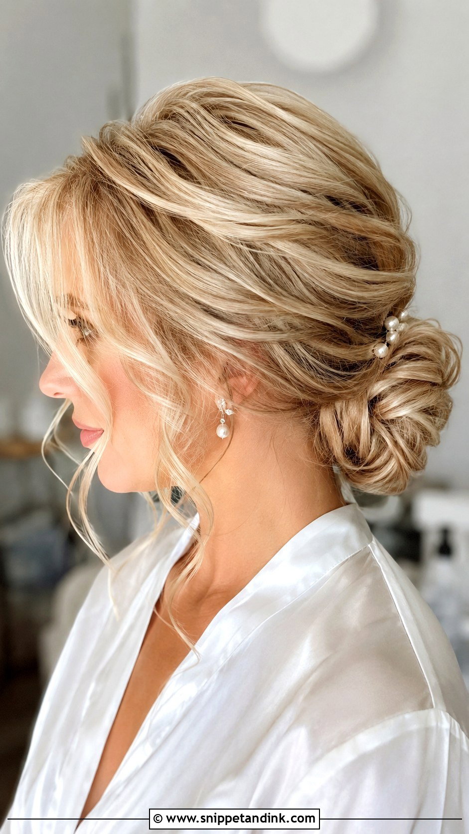 Soft Low Bridal Bun - Snippet and Ink - 15 Soft Wedding Hairstyles