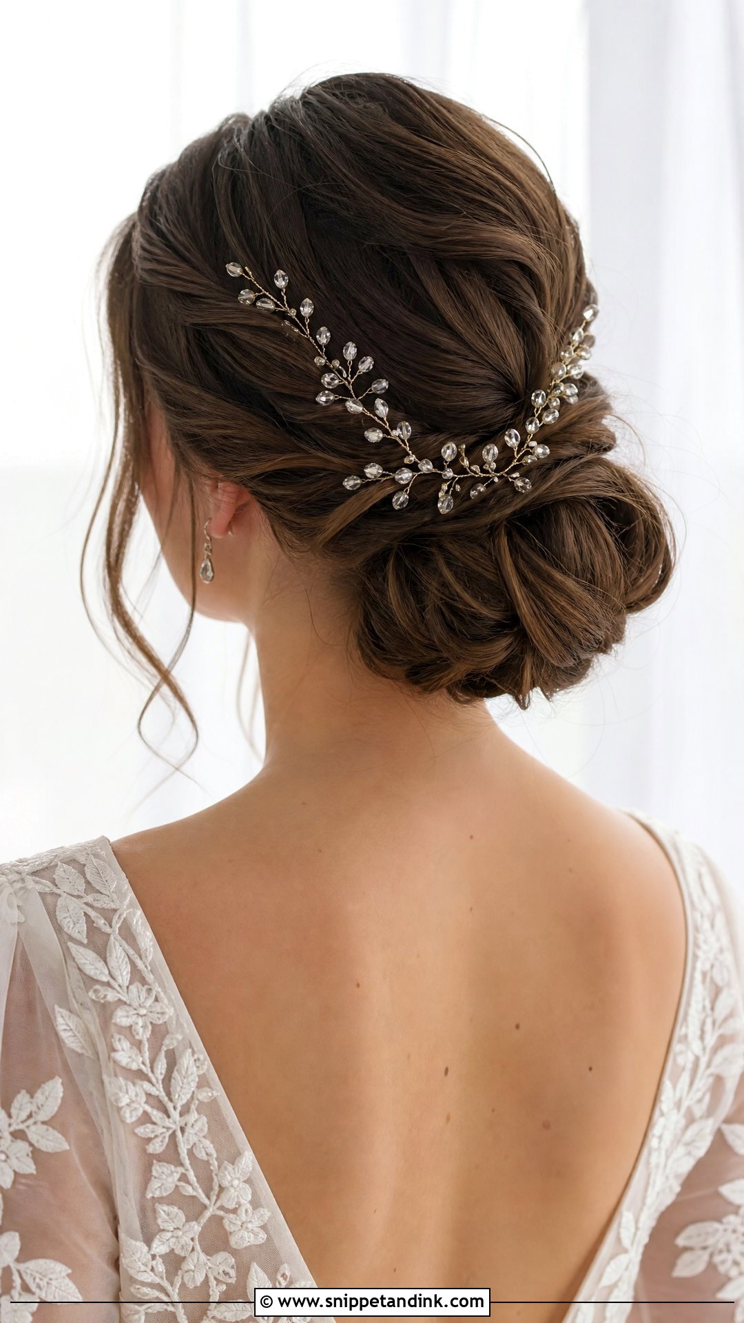 Soft Low Bun Wedding Hair With Hair Vine - Snippet and Ink - 20 Soft Low Bun Wedding Hair Ideas