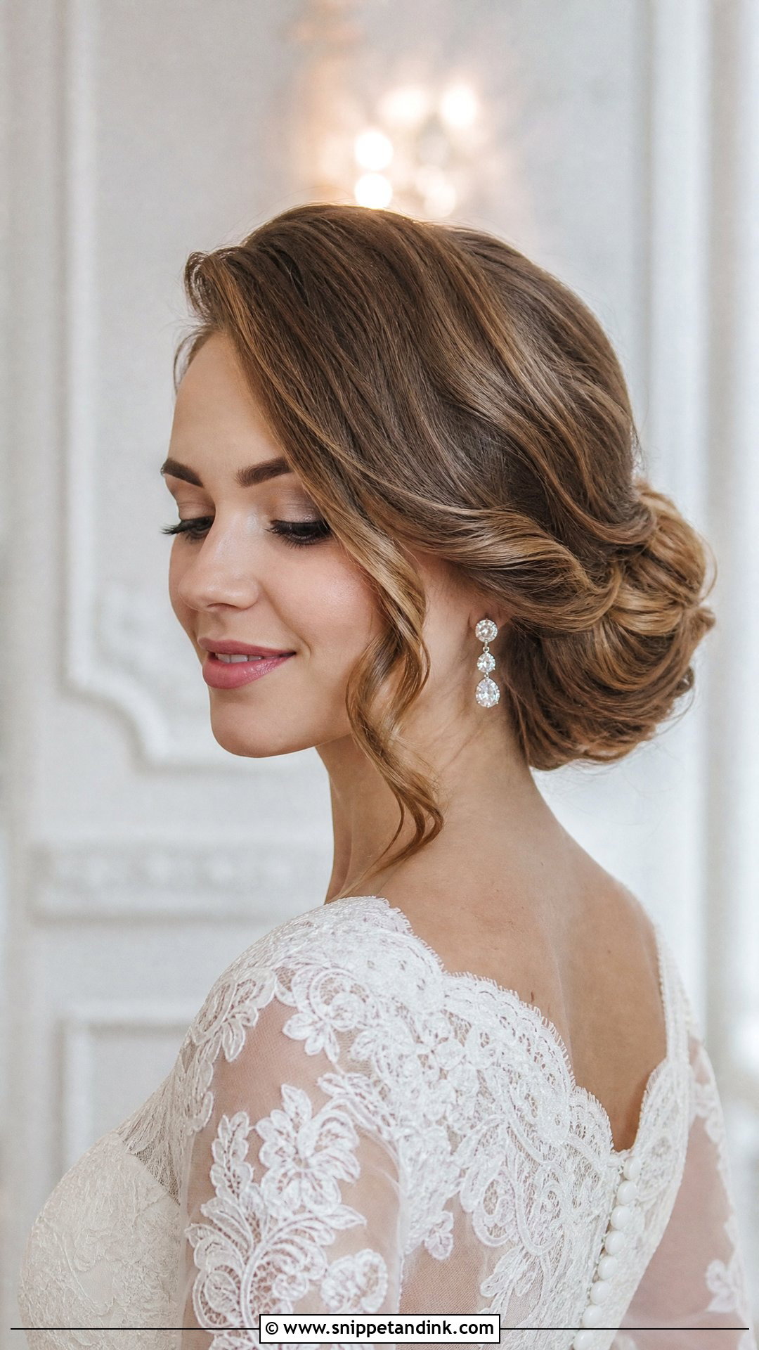 Soft Low Bun Wedding Hair With Side Part - Snippet and Ink - 20 Soft Low Bun Wedding Hair Ideas