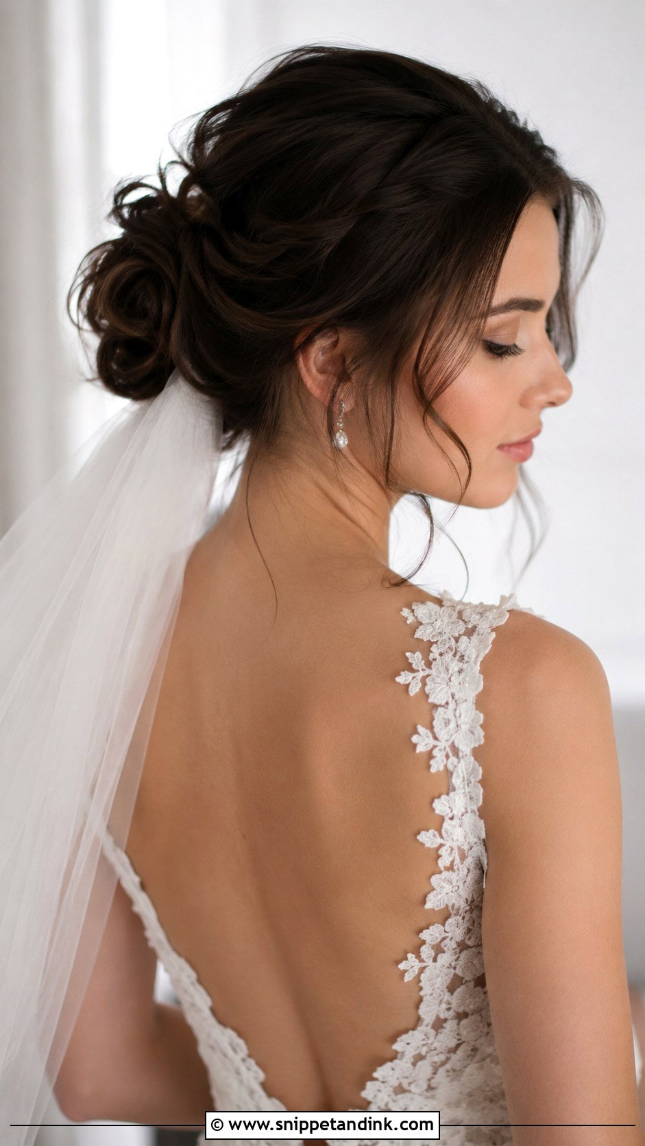 Soft Updo With Veil - Snippet and Ink - 20 Brunette Bride Hairstyles