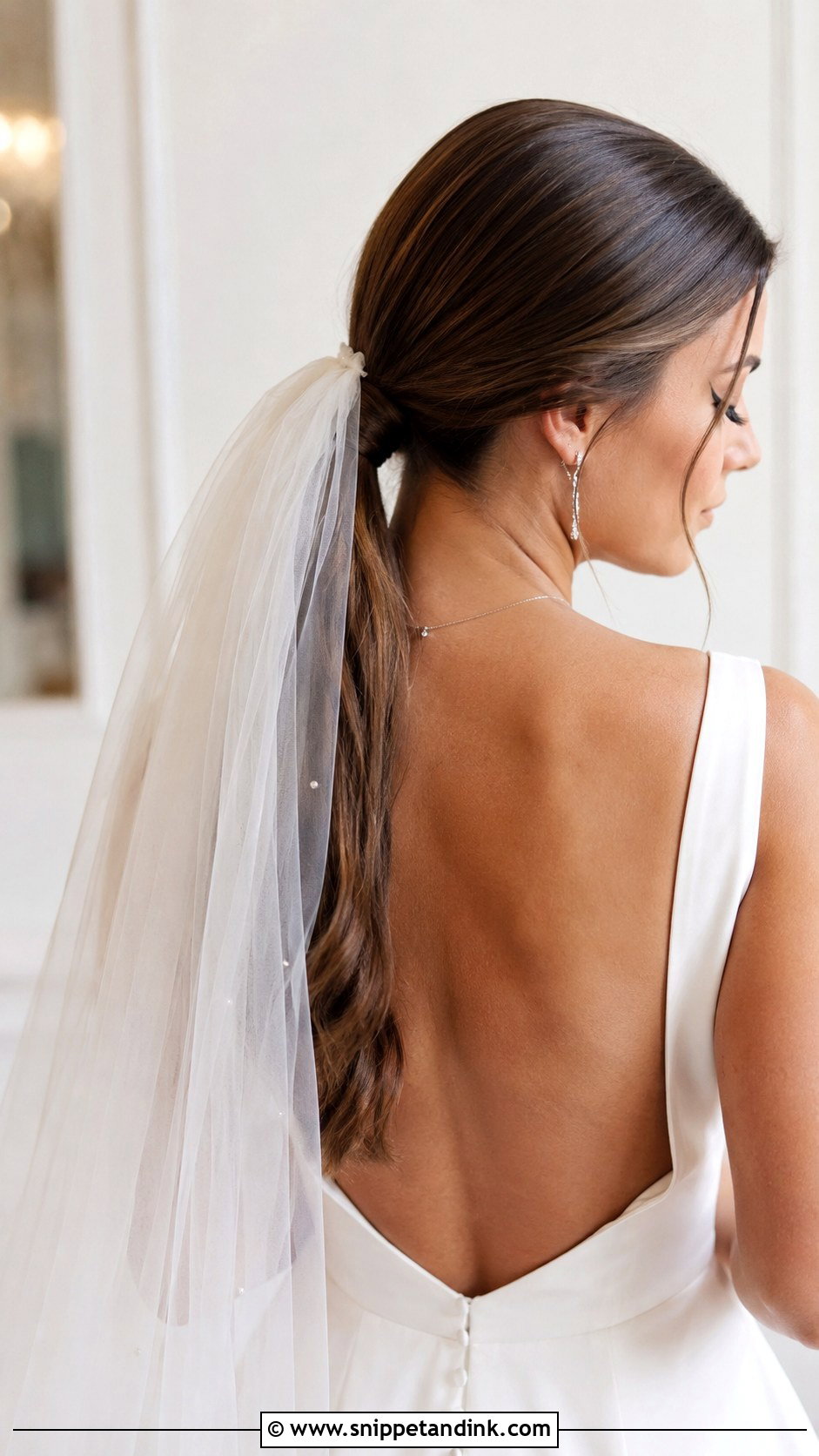 Straight Hair Low Ponytail With Veil - Snippet and Ink - 25 Straight Bridal Hairstyles