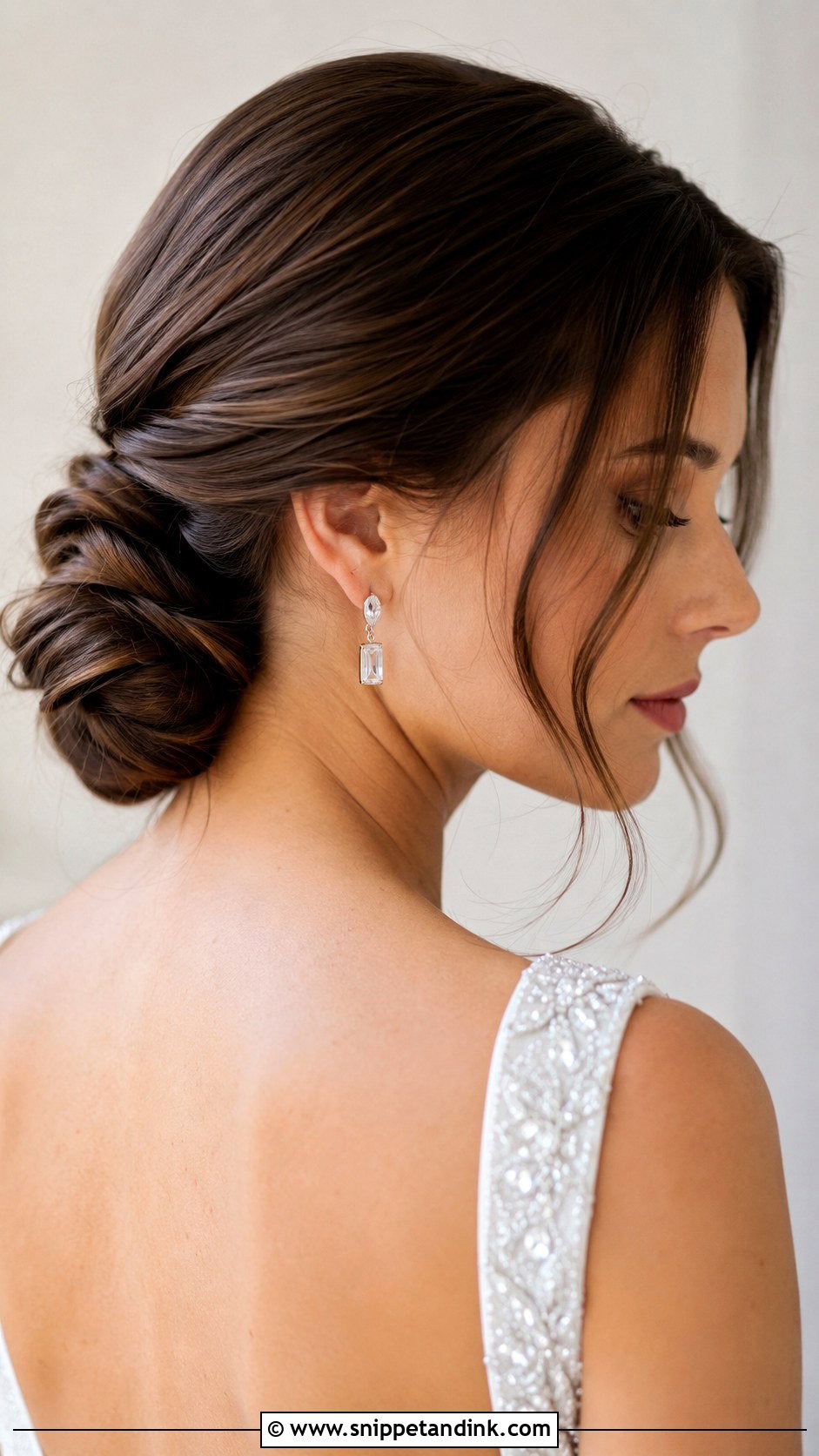 Straight Hair Low Twisted Chignon - Snippet and Ink - 25 Wedding Guest Hairstyles Straight Hair