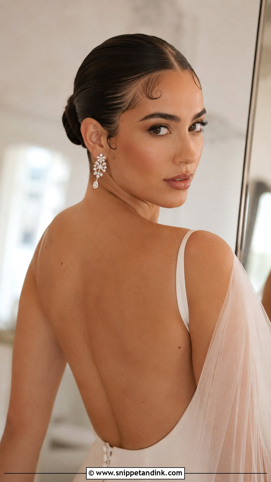 Straight Hair Sleek Bun With Baby Hairs - Snippet and Ink - 25 Straight Wedding Hairstyles