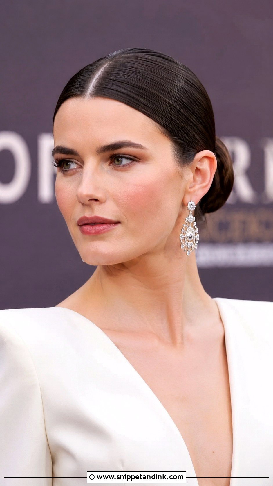 Straight Hair Sleek Bun With Center Part - Snippet and Ink - 20 Straight Hair for Wedding Ideas