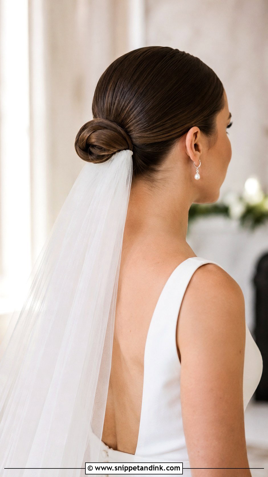 Straight Hair Sleek Bun With Veil Underneath - Snippet and Ink - 25 Straight Bridal Hairstyles