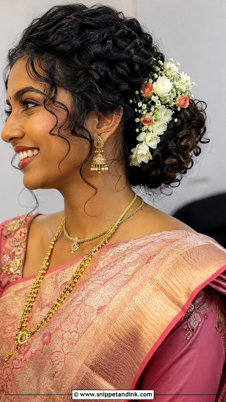 Tamil Bridesmaid Curly Bun With Flowers - Snippet and Ink - 20 Tamil Bridesmaid Hairstyle Ideas