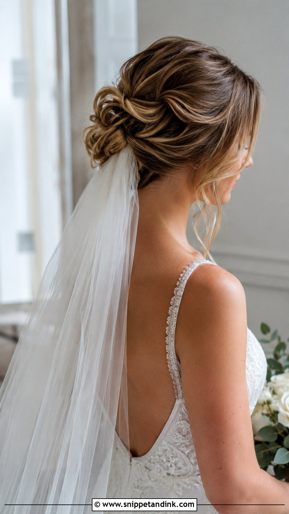 Textured Bun Updo With Long Veil - Snippet and Ink - 25 Updo with Veil Ideas
