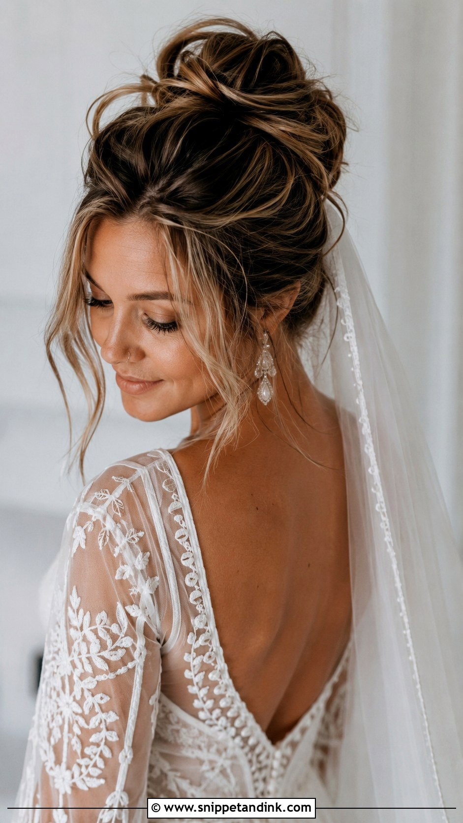 Textured Bun With Cathedral Veil - Snippet and Ink - 25 Cathedral Veil Hairstyle Ideas