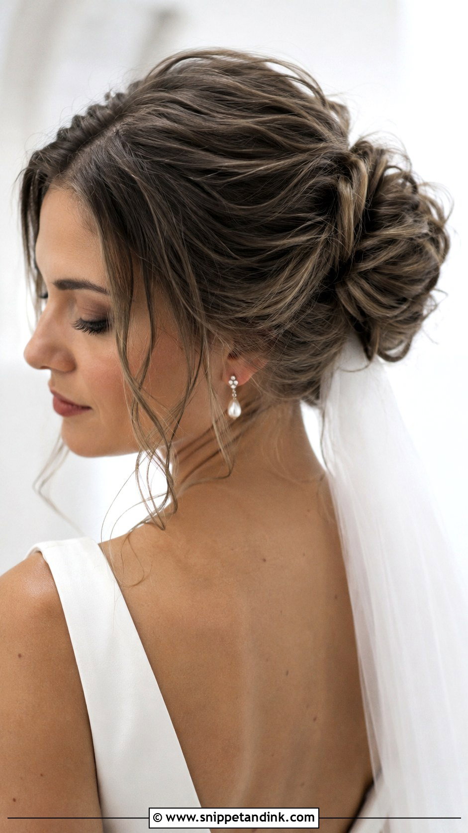 Textured Bun With Veil Underneath - Snippet and Ink - 25 Veil Under Updo Ideas