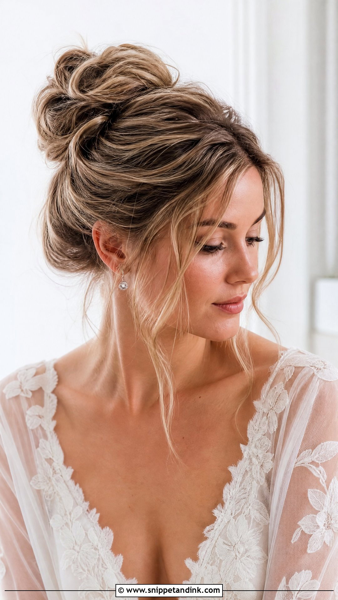 Textured Bun with Face Framing Pieces - Snippet and Ink - 20 Updo Wedding Hairstyles for Bride
