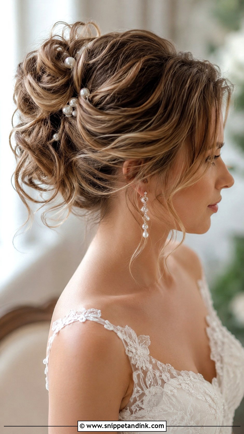 Textured High Bun With Waves - Snippet and Ink - 25 High Bun Wedding Ideas