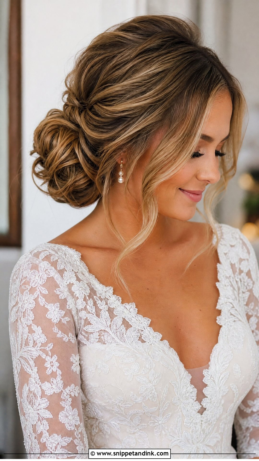 Textured Low Bridal Bun - Snippet and Ink - 15 Bridal Bun Updo Ideas
