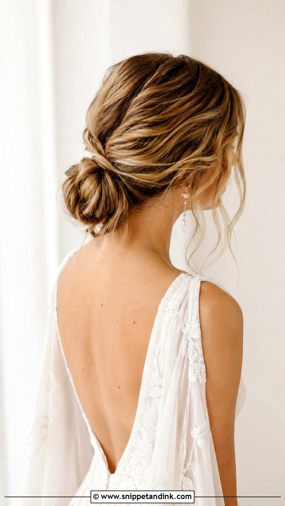 Textured Low Bun With Loose Tendrils - Snippet and Ink - 20 Elegant Wedding Hair Updo Ideas
