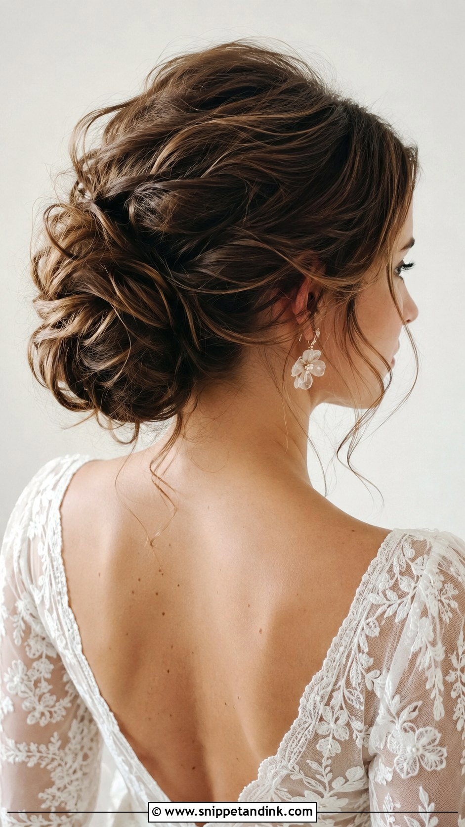 Textured Low Bun With Volume - Snippet and Ink - 25 Hailey Bieber Wedding Hair Ideas