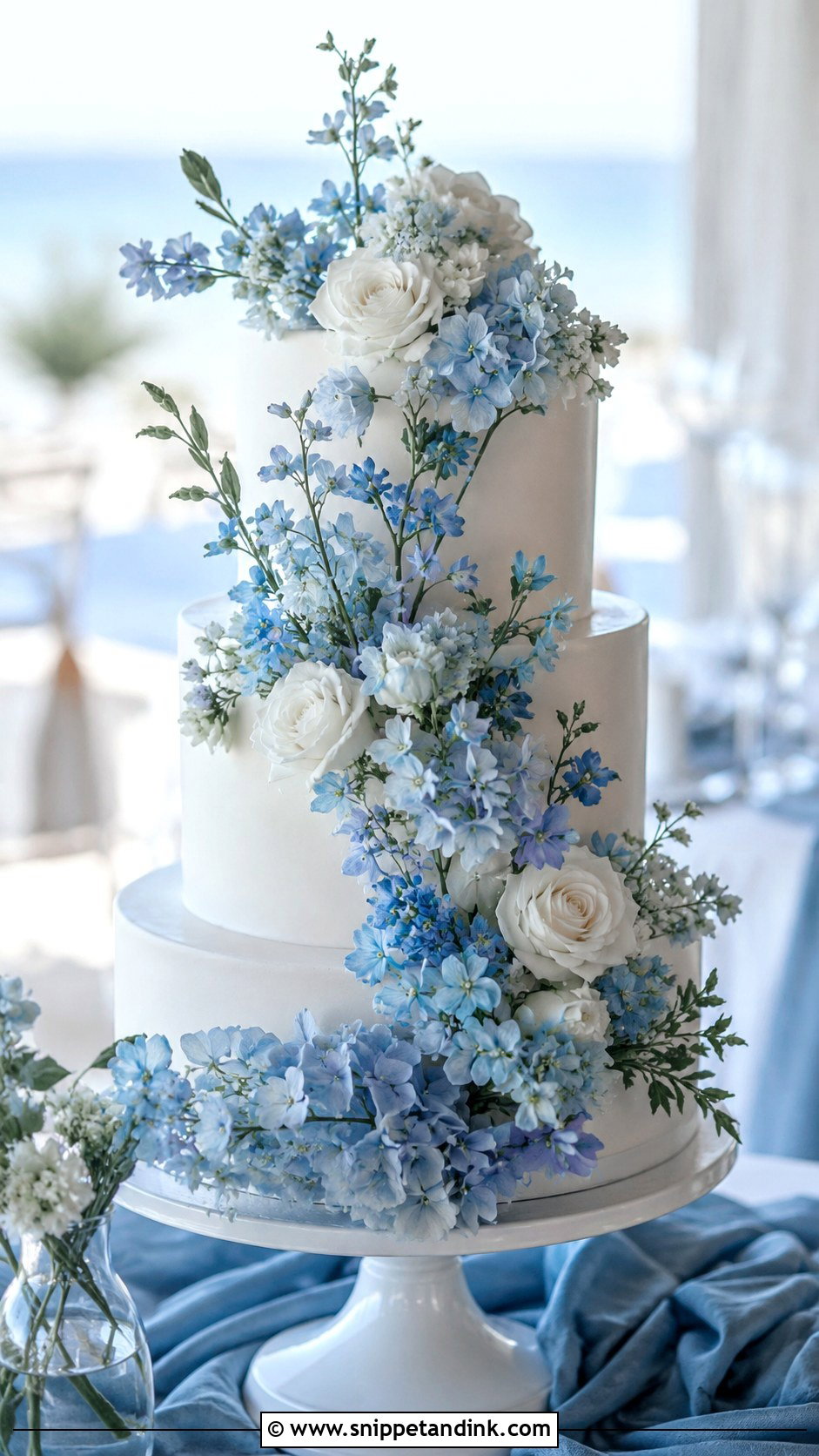 Three Tier Floral Wedding Cake With Blue Flowers - Snippet and Ink - 20 Three Tier Floral Wedding Cake Ideas