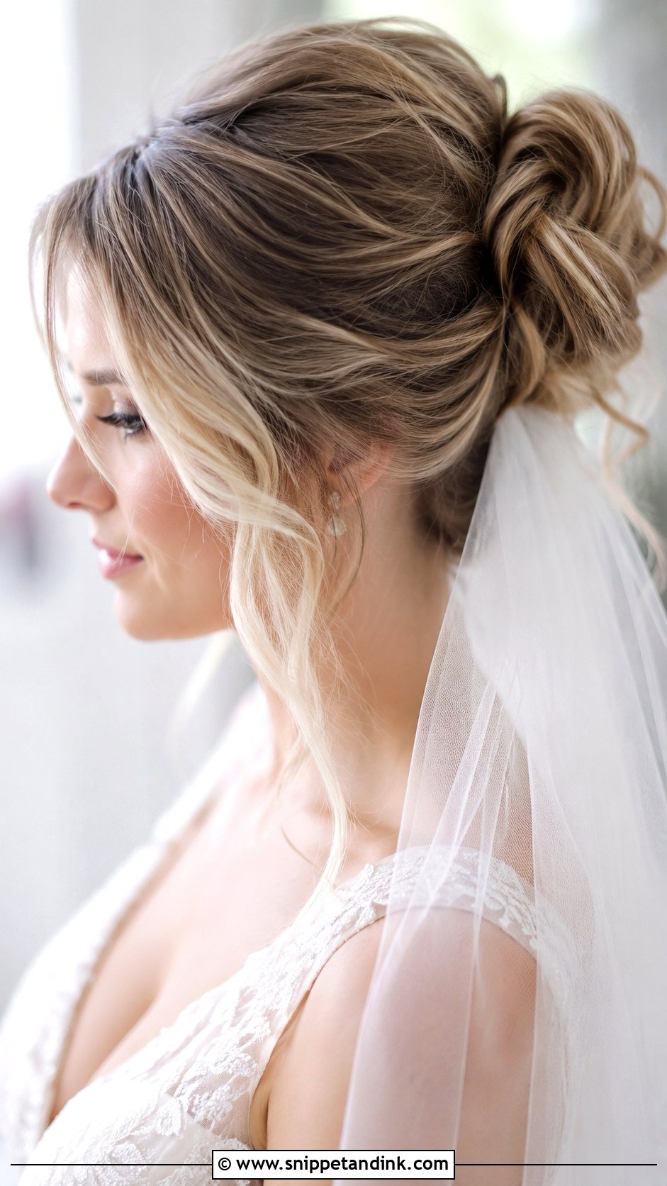 Tousled Bridal Bun With Tendrils - Snippet and Ink - 20 Natural Bridal Hair Ideas