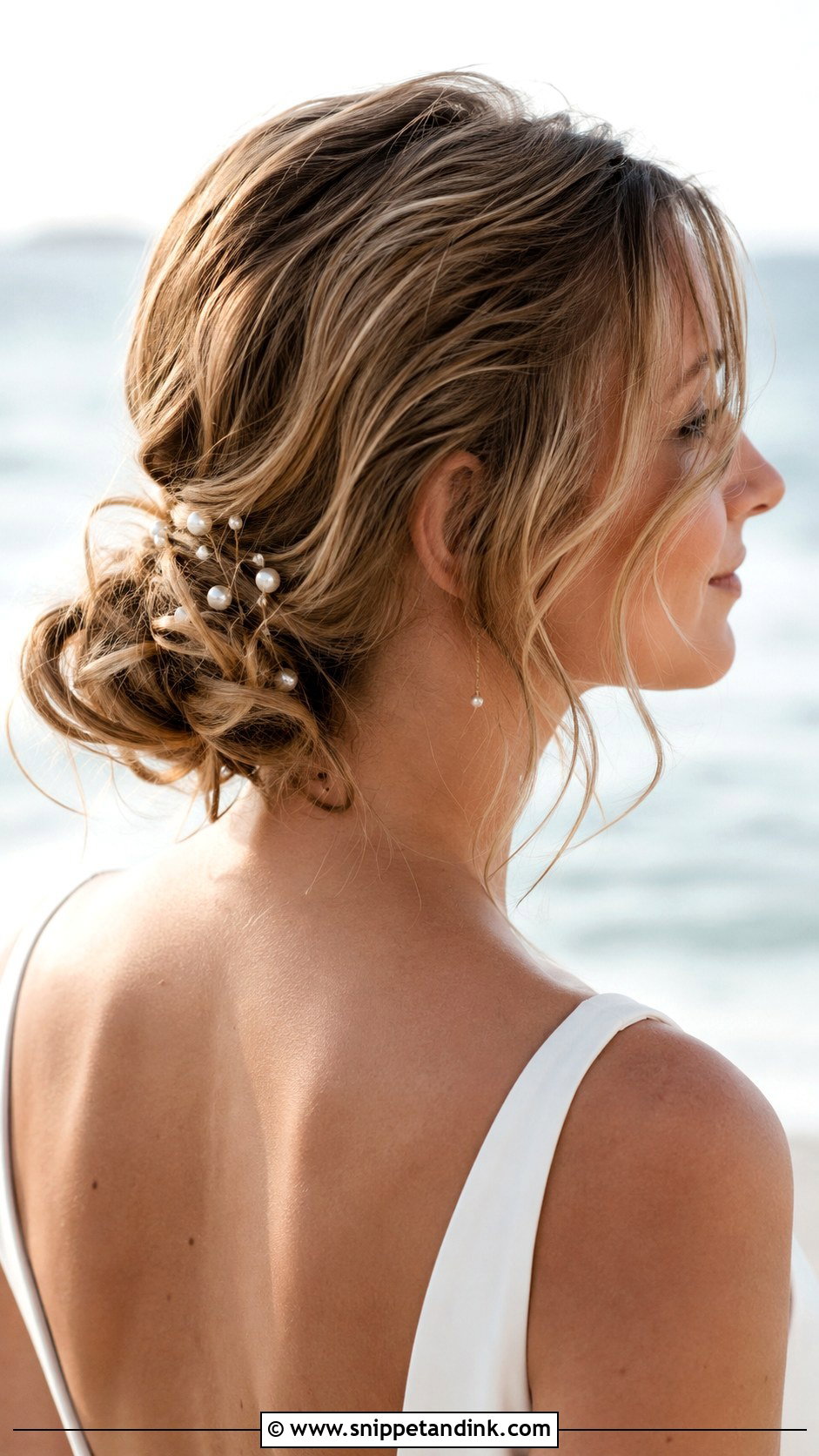 Tousled Low Bun - Snippet and Ink - 20 Beachy Wedding Hair Ideas