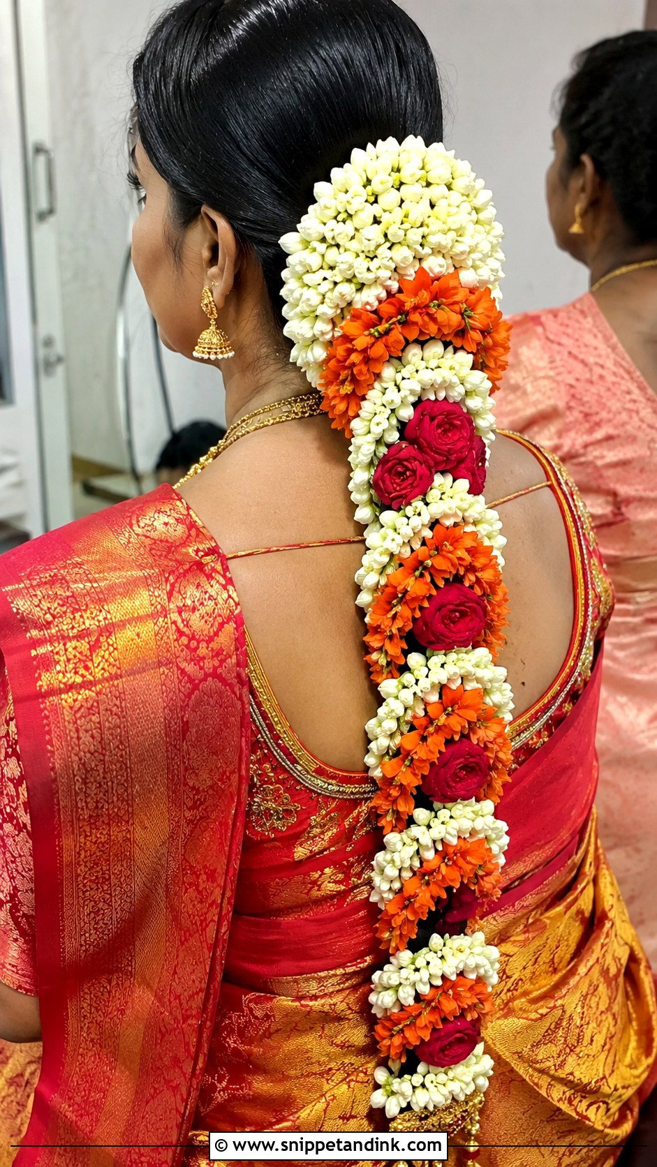 Traditional Long Braid With Fresh Flowers - Snippet and Ink - 20 Valaikappu Hairstyles