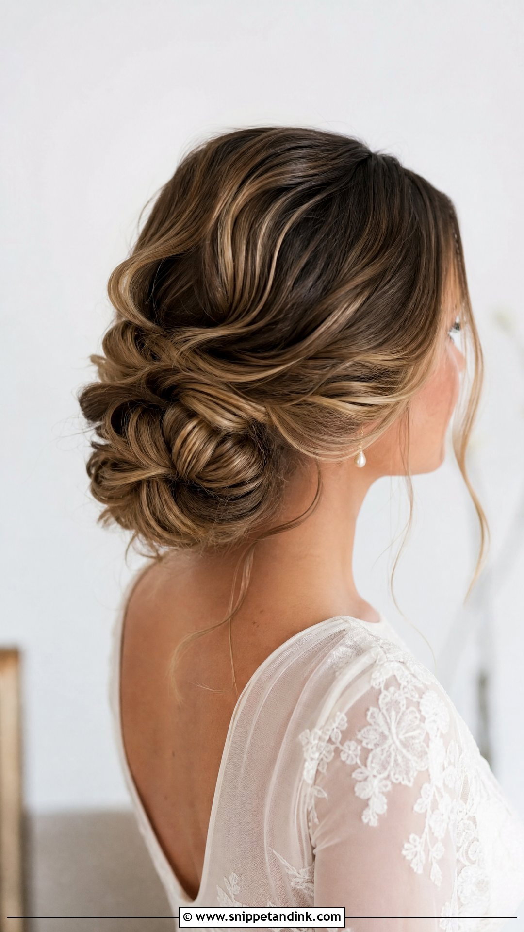 Twisted Bridal Bun - Snippet and Ink - 15 Bridal Hair Bun Style Ideas