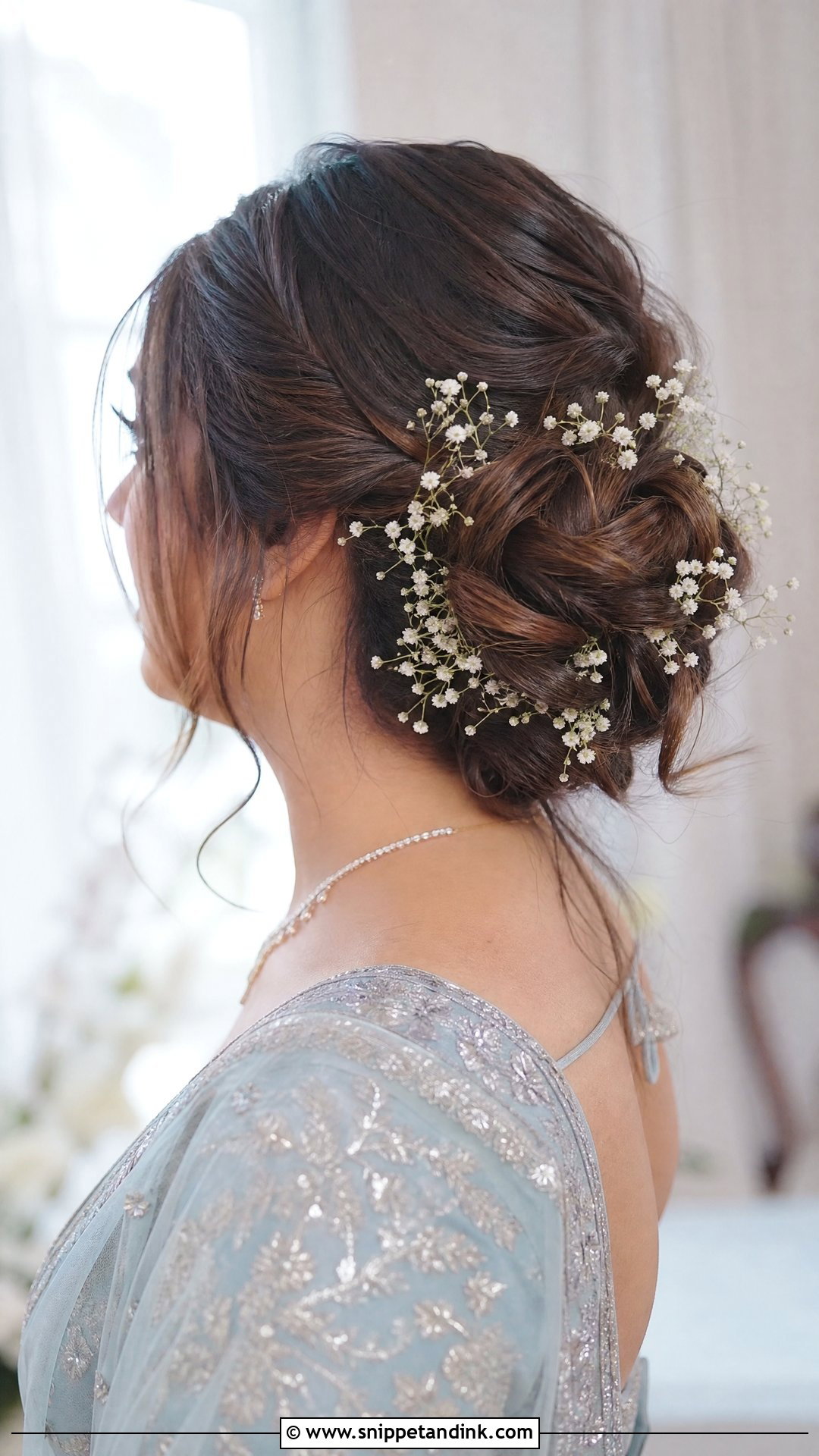 Twisted Bun With Babys Breath - Snippet and Ink - 20 Indian Wedding Bun Bridal Hairstyle Ideas