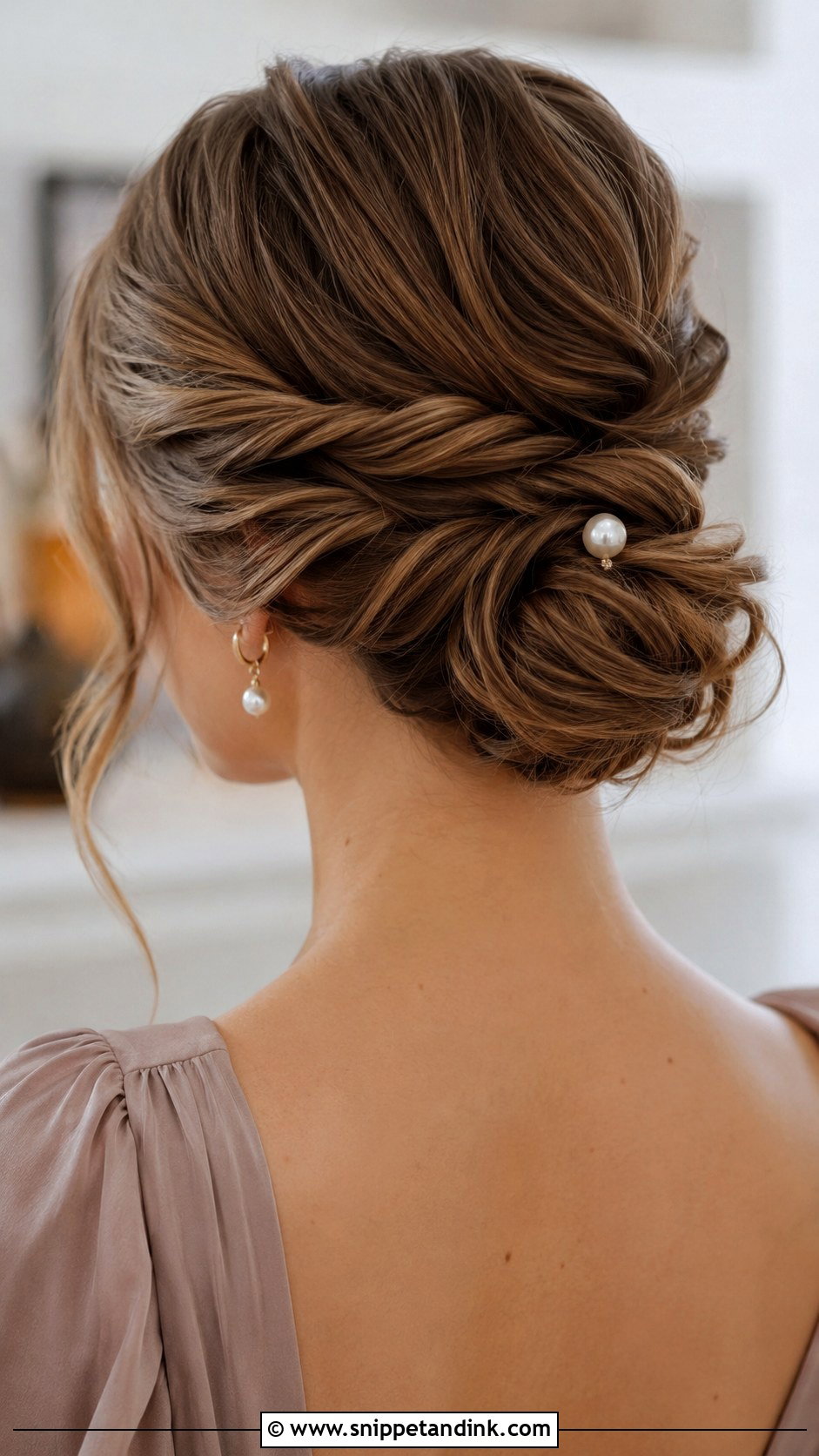 Twisted Low Bun - Snippet and Ink - 20 Low Bun Wedding Guest Hair Ideas