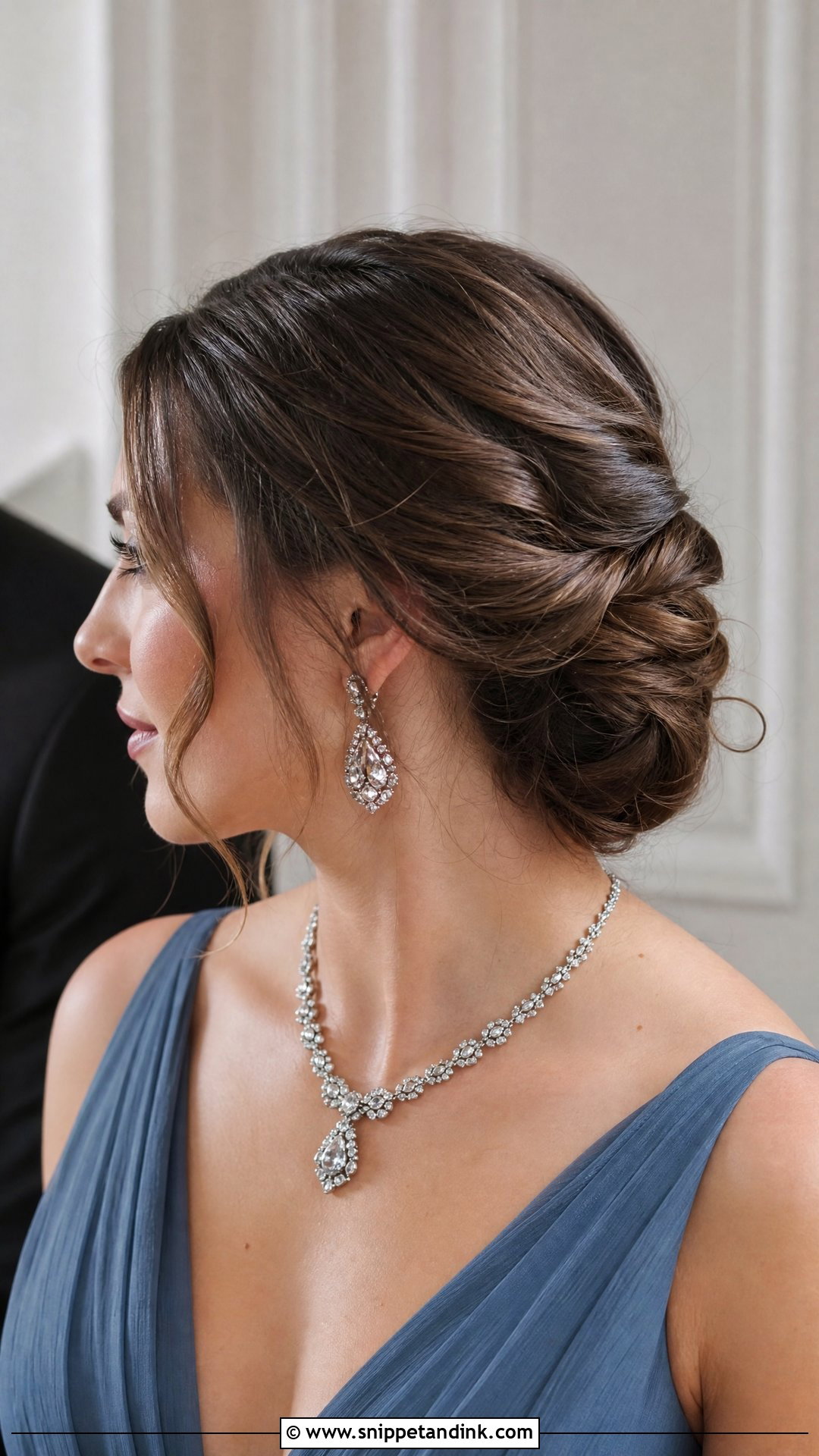 Twisted Low Bun - Snippet and Ink - 20 Mother of the Bride Updo Hairstyles